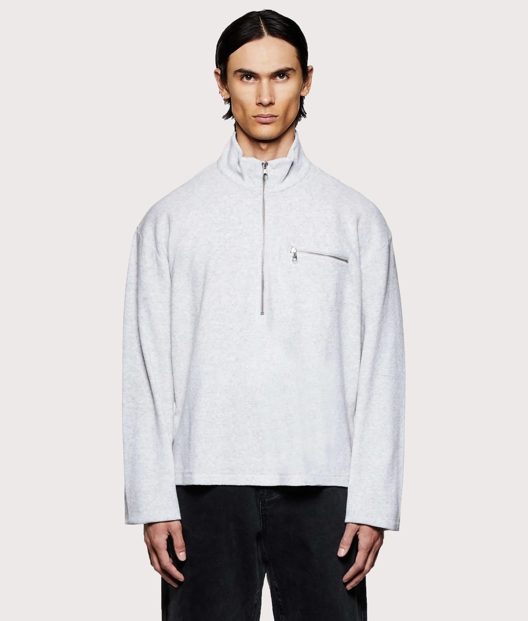 MKI MIYUKI ZOKU Towelling Quarter Zip Sweatshirt in Ash at EQVVS Menswear. Model front shot.