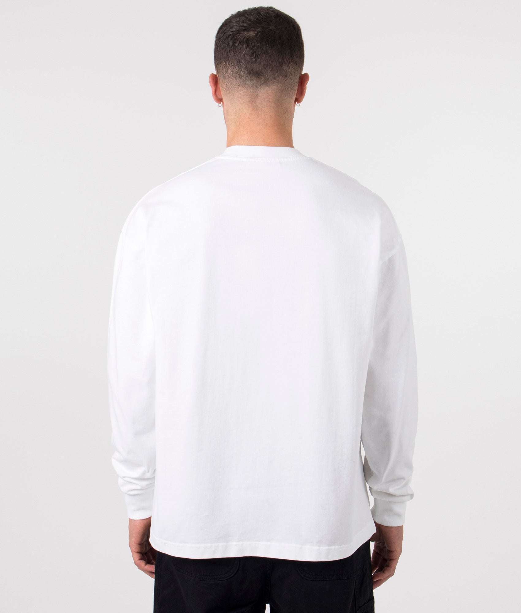 Oversized Uniform Long Sleeve T-Shirt in White by MKI MIYUKI ZOKU. EQVVS Model Shot.