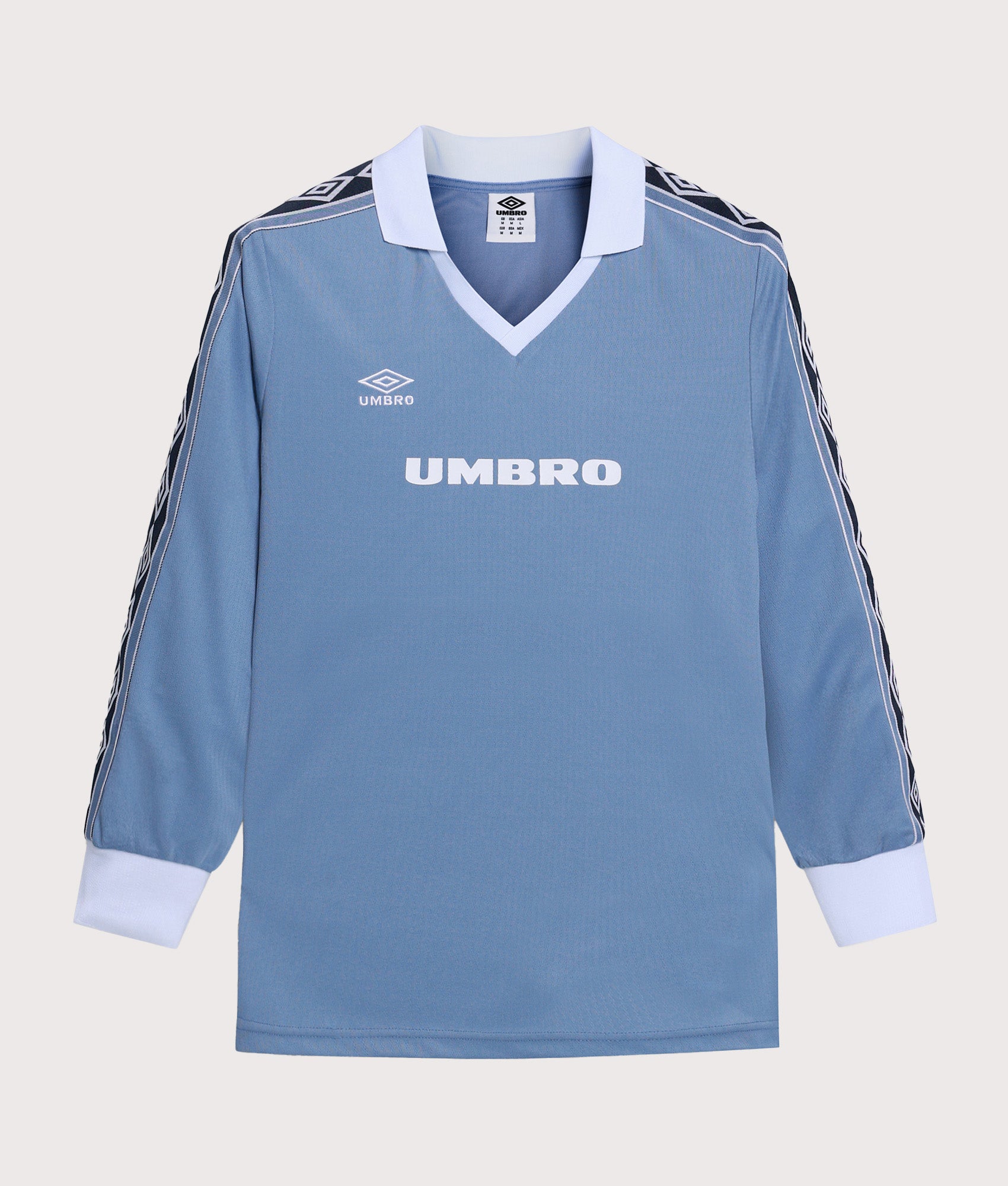 Umbro Taped Long Sleeve Football Jersey in Infinity and Brilliant White at EQVVS Menswear. Front shot.