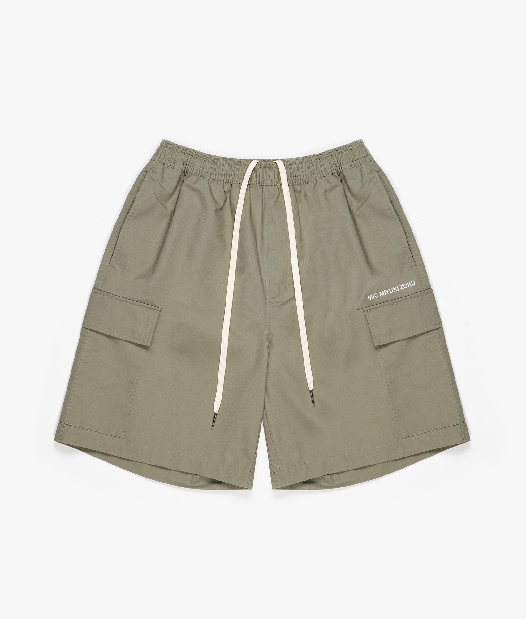 Relaxed Fit Ripstop Cargo Shorts in Sage Green by MKI MIYUKI ZOKU. EQVVS Front Flat Shot.