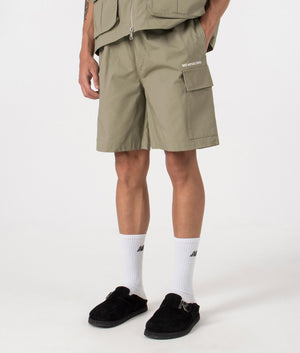 MKI Relaxed Fit Ripstop Cargo Shorts in Sage Green. Side angle model shot at EQVVS.
