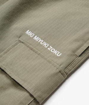 Relaxed Fit Ripstop Cargo Shorts in Sage Green by MKI MIYUKI ZOKU. EQVVS Detail Shot.
