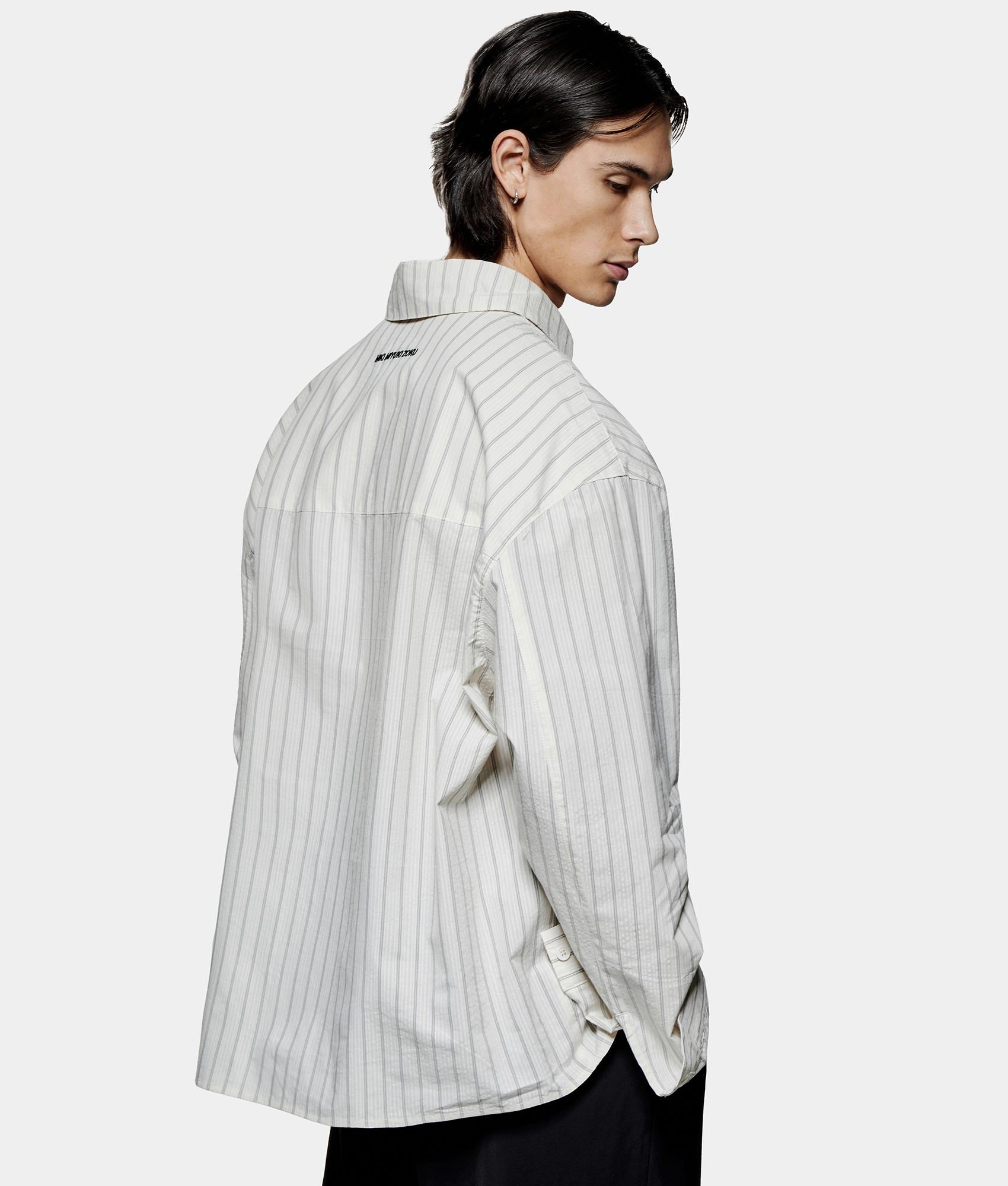 Box Dress Shirt. Shot by EQVVS. Back model angled shot.