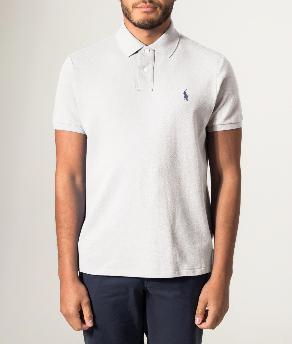 Custom Slim Fit Mesh Polo Shirt. Shot by EQVVS. Front model shot.