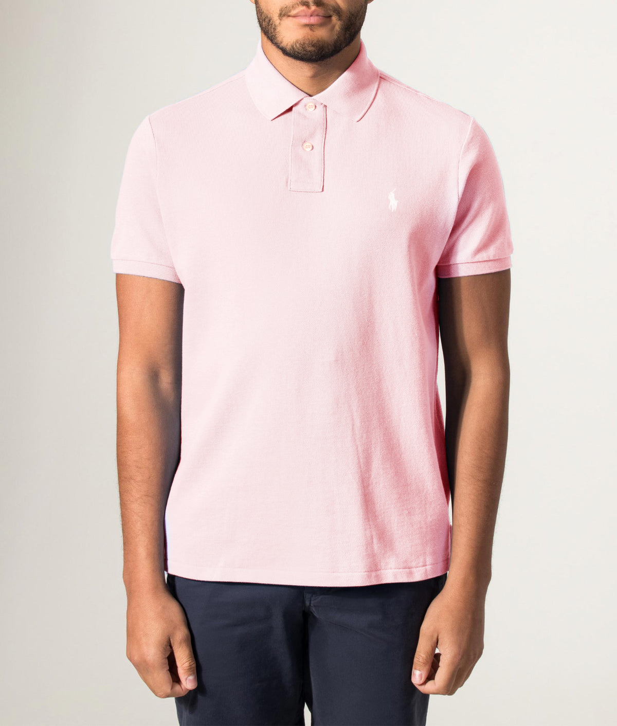 Polo Ralph Lauren Custom Slim Fit Mesh Polo Shirt in Bath Pink at EQVVS Menswear. Front model shot.