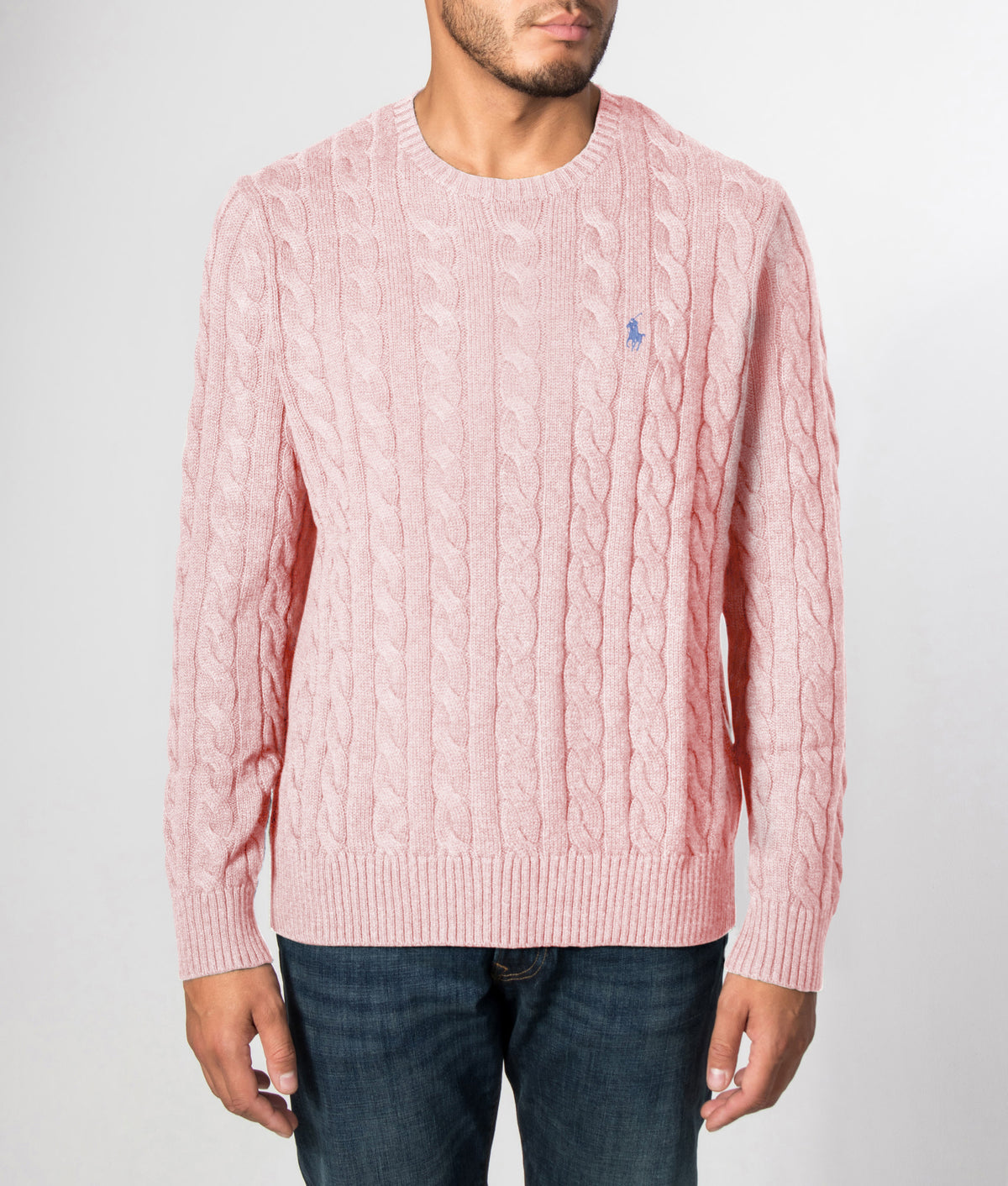 Polo Ralph Lauren Regular Fit Cable Knit Cotton Jumper in Ballet Pink at EQVVS Menswear. Front model shot.
