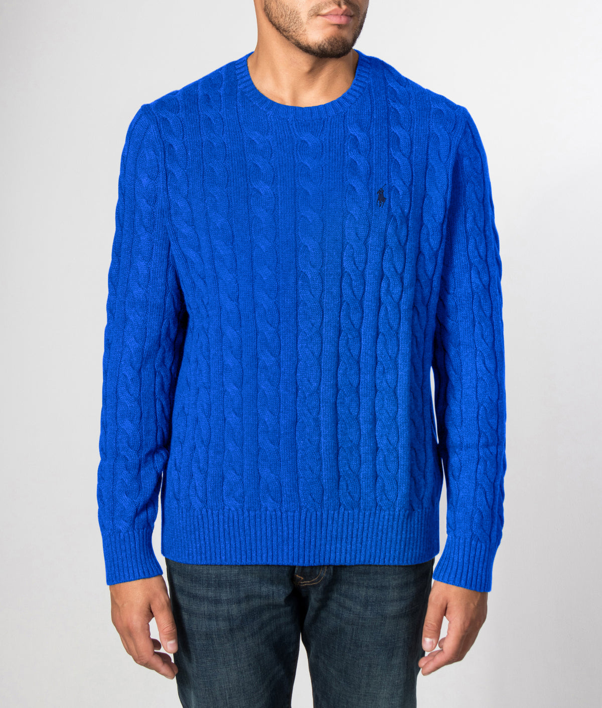 Polo Ralph Lauren Regular Fit Cable Knit Cotton Jumper in New Iris Blue at EQVVS Menswear. Front model shot.