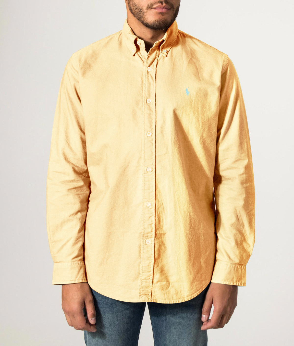 Polo Ralph Lauren Custom Fit Garment-Dyed Oxford Shirt in Corn Yellow at EQVVS Menswear. Front model shot.