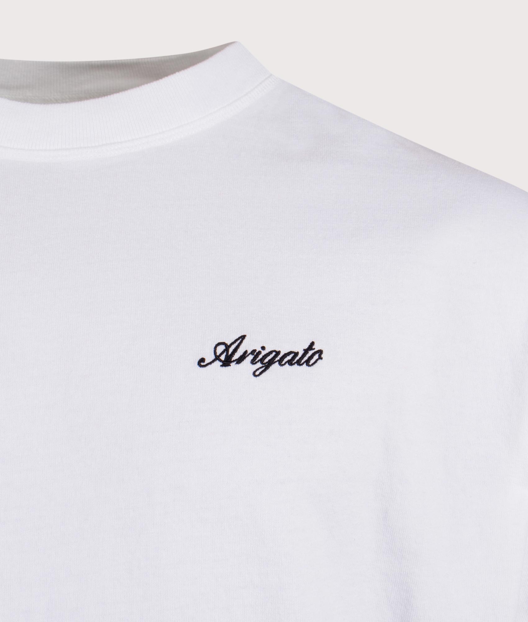 Axel Arigato Honor T-Shirt in White. Shot at EQVVS.  Detail shot. 