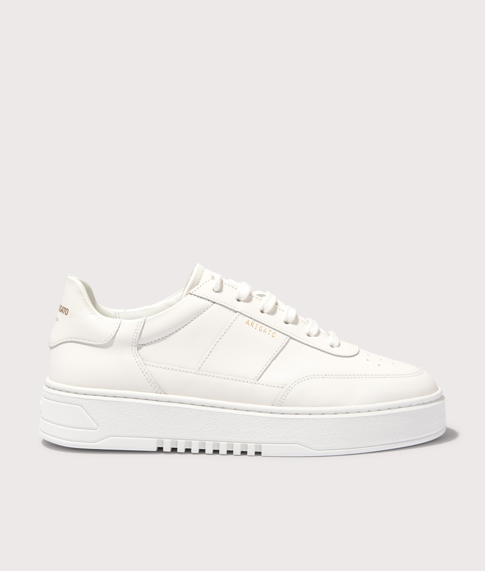 Axel Arigato Orbit Vintage Sneakers in White/White. Shot at EQVVS.  Side shot. 