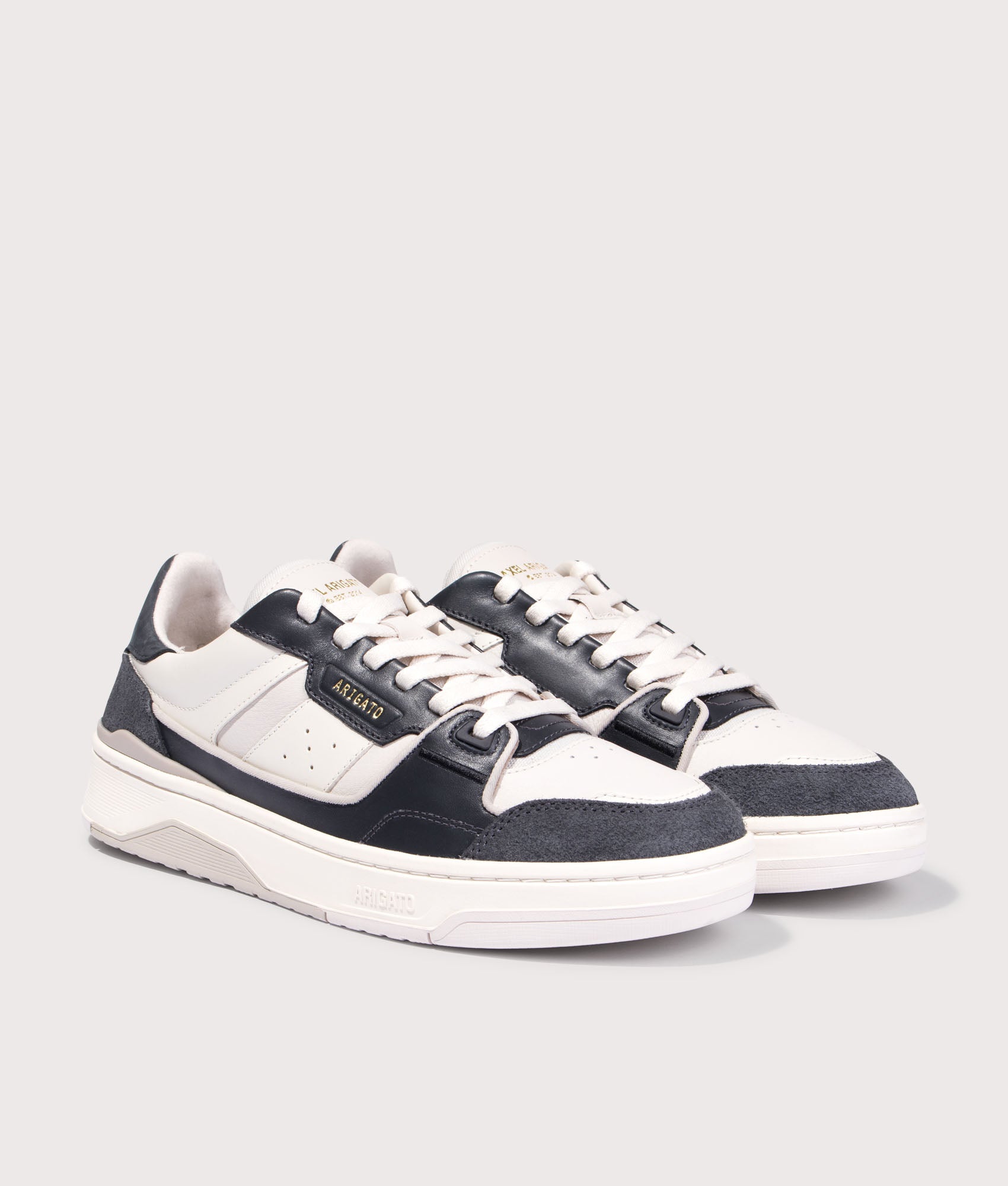 Clay Sneakers. Shot by EQVVS. Front angled shot.