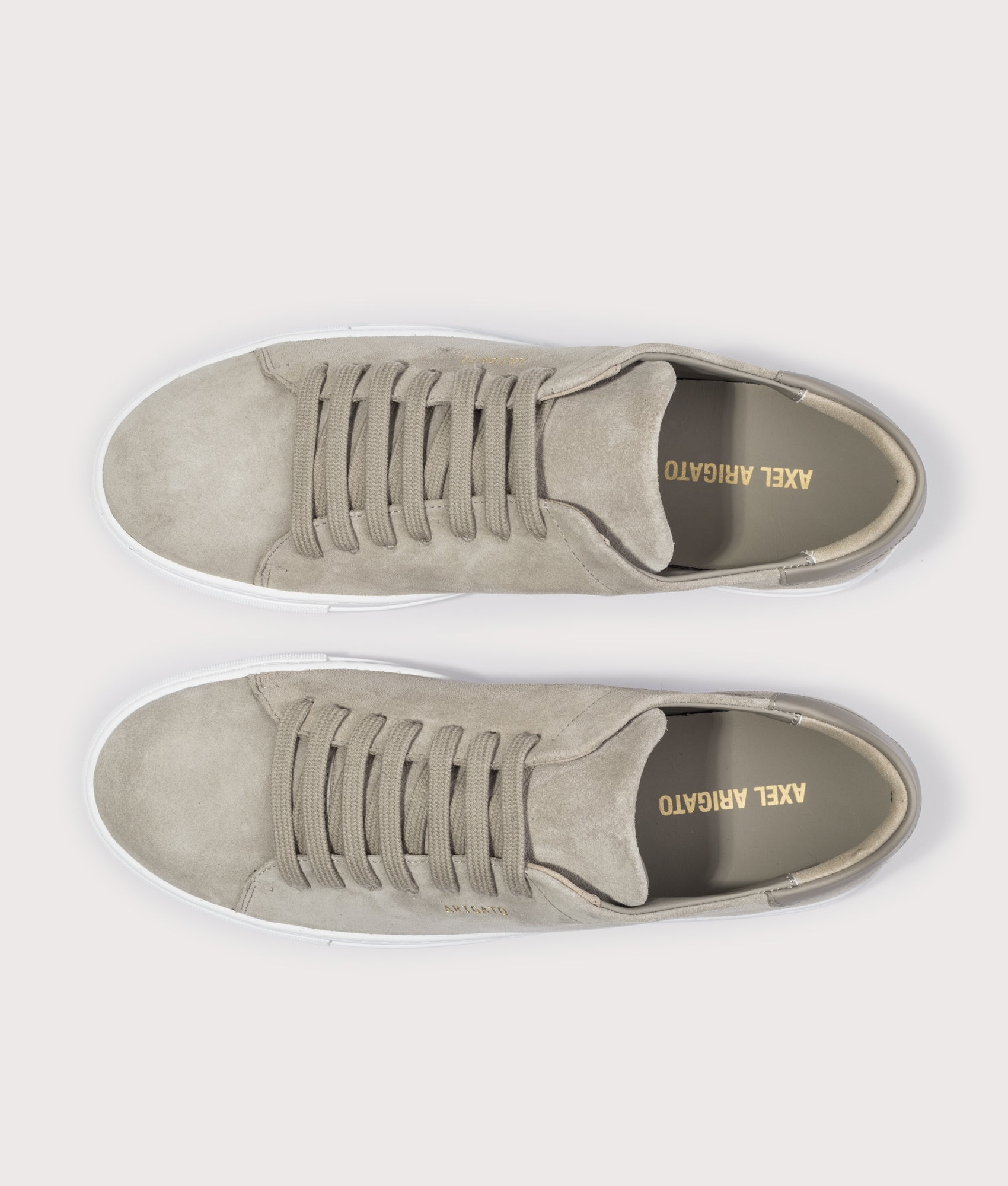 Axel Arigato Clean 90 Suede Sneaker in Beige and White at EQVVS Menswear. Top shot.