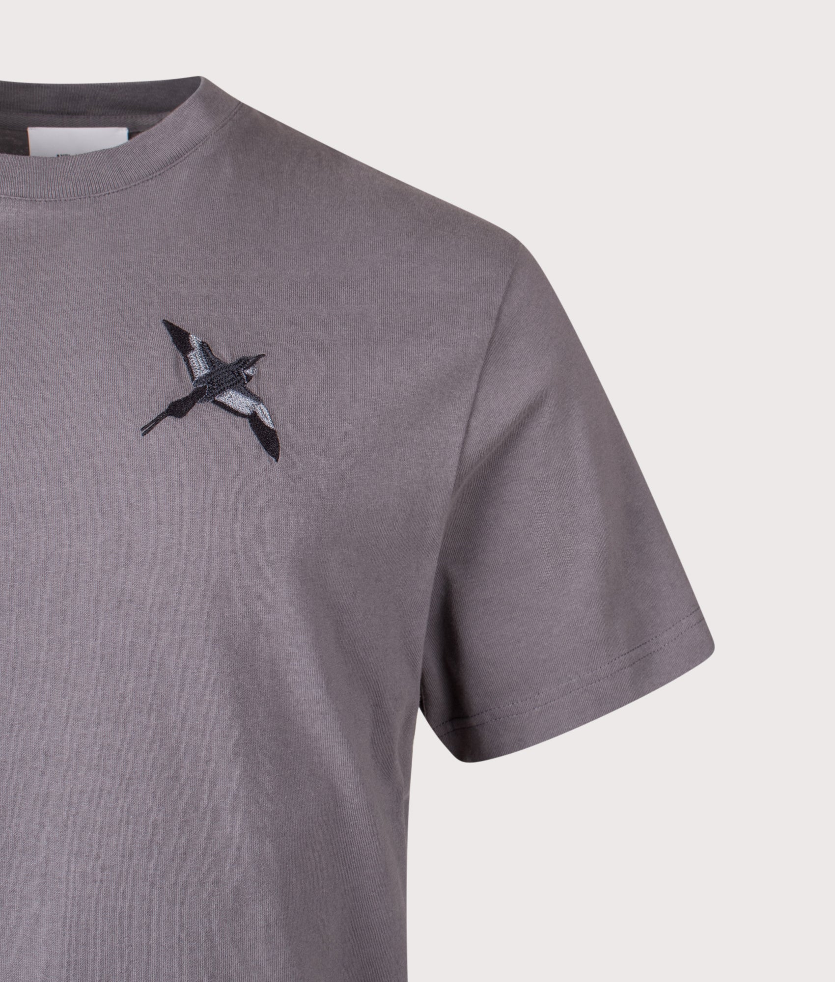 Micro Bee Bird T-Shirt by Axel Arigato in Steel Grey. Shot by EQVVS. Detail shot.
