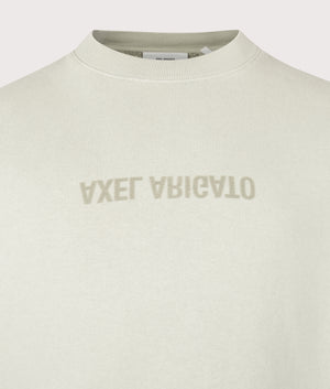 Distort Washed Sweatshirt by Axel Aroigato in Dusty Green. Shot by EQVVS. Detail shot.