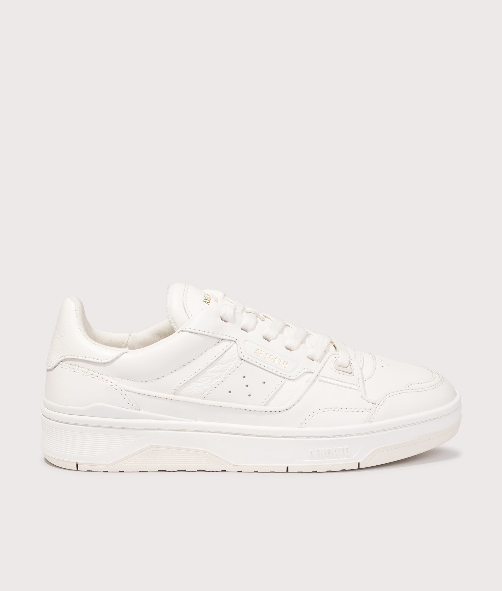 Axel Arigato Clay sneakers in Off White at EQVVS Menswear. Side shot.