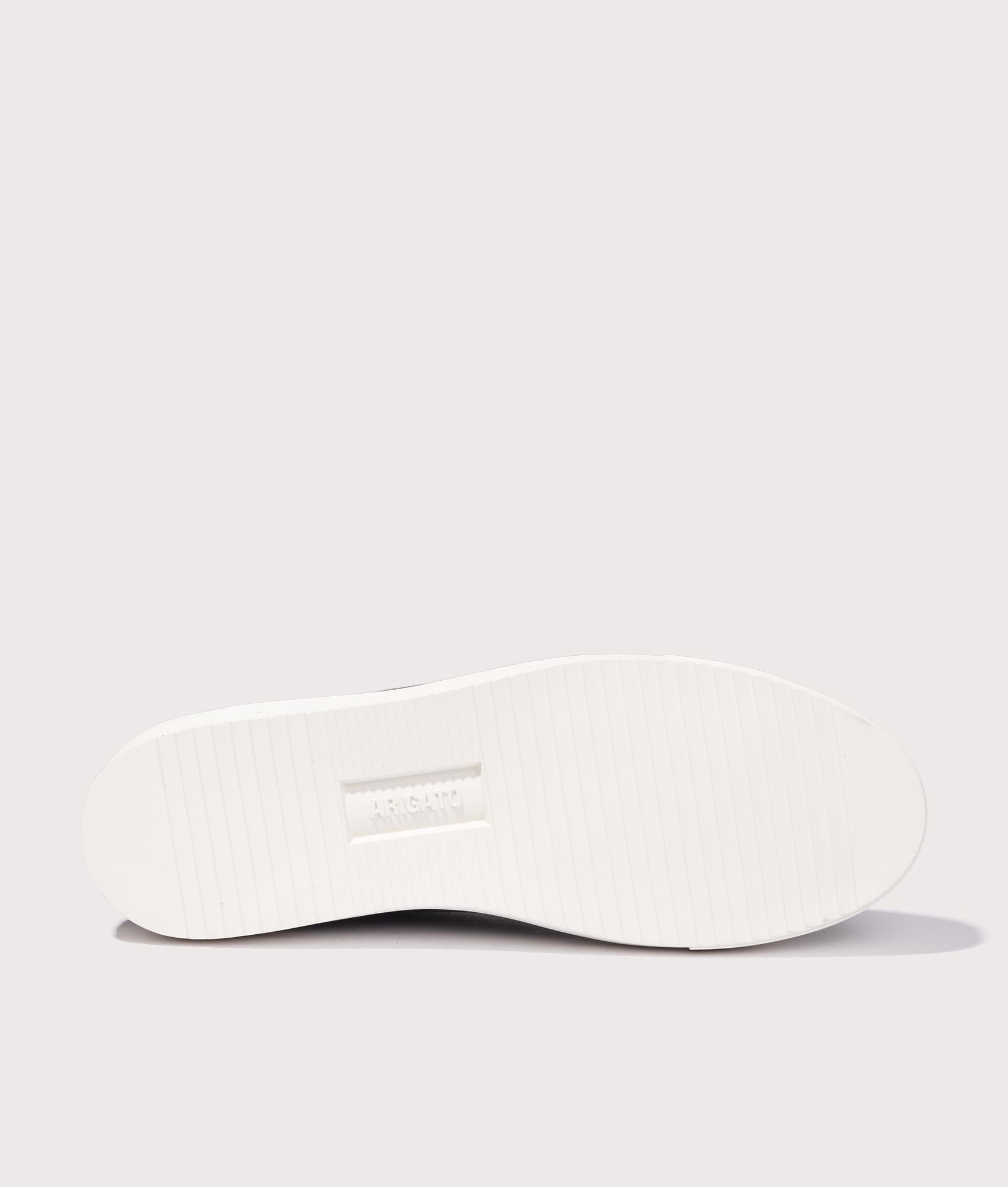 Axel Arigato Clean 90 Suede Sneakers in Dark Blue and Off White at EQVVS Menswear. Sole shot.