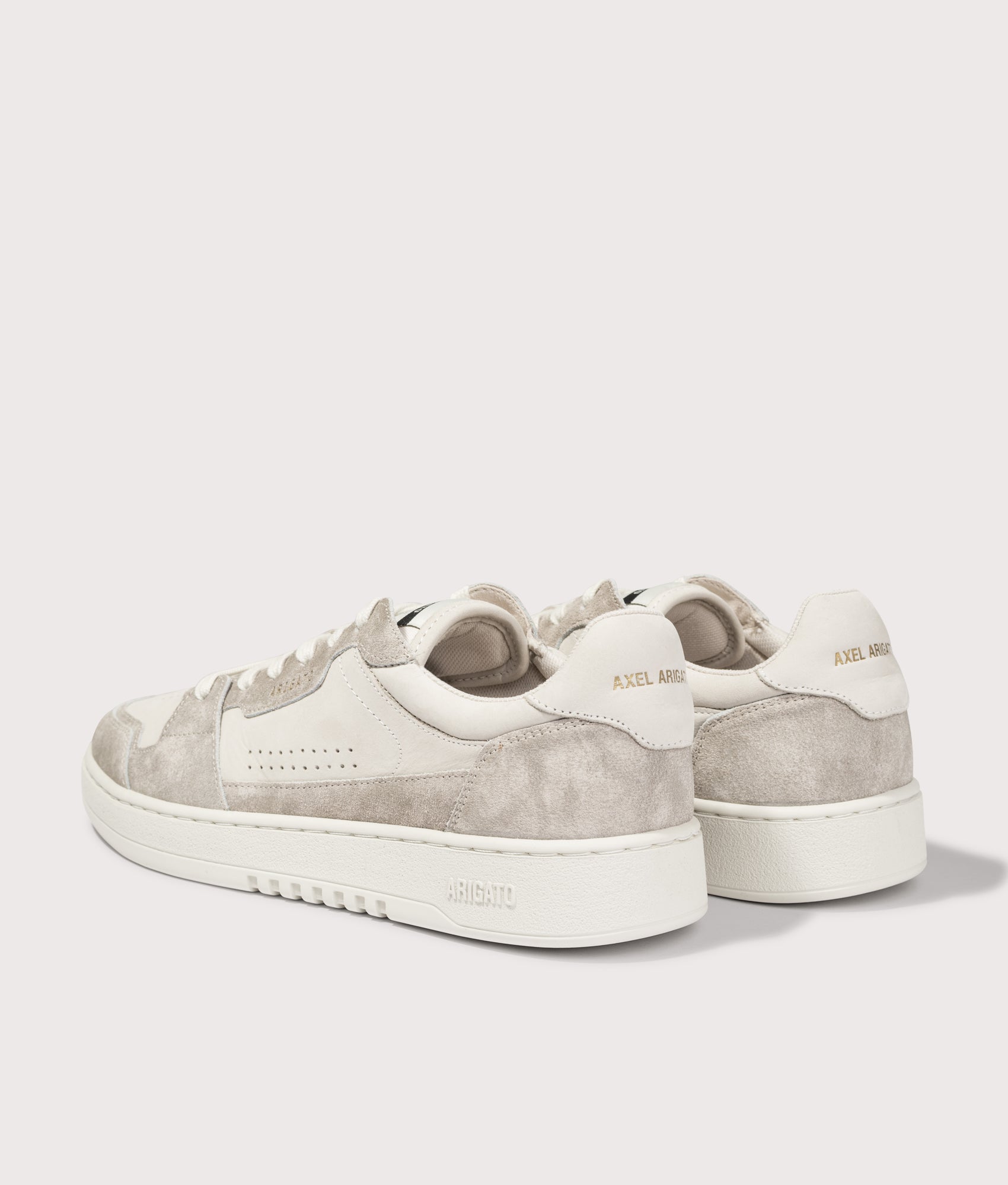 Axel Arigato Dice Lo sneakers in Off White at EQVVS Menswear. Angled back shot.