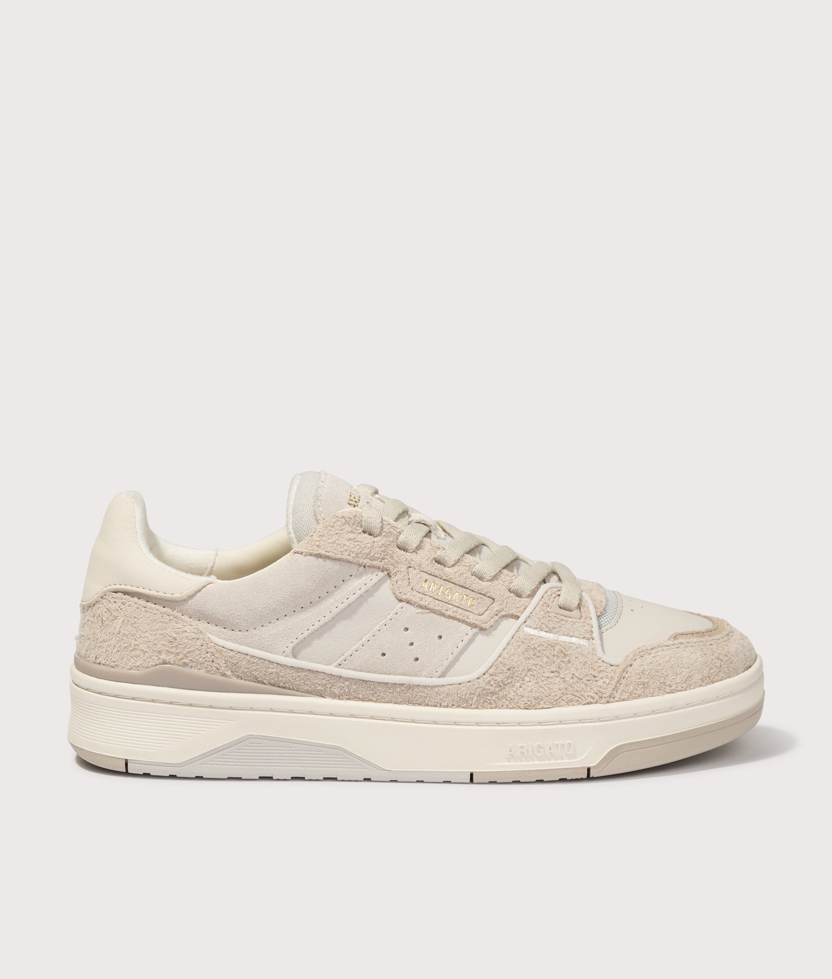Axel Arigato Clay Sneakers in Beige and Light Taupe at EQVVS Menswear. Side shot.