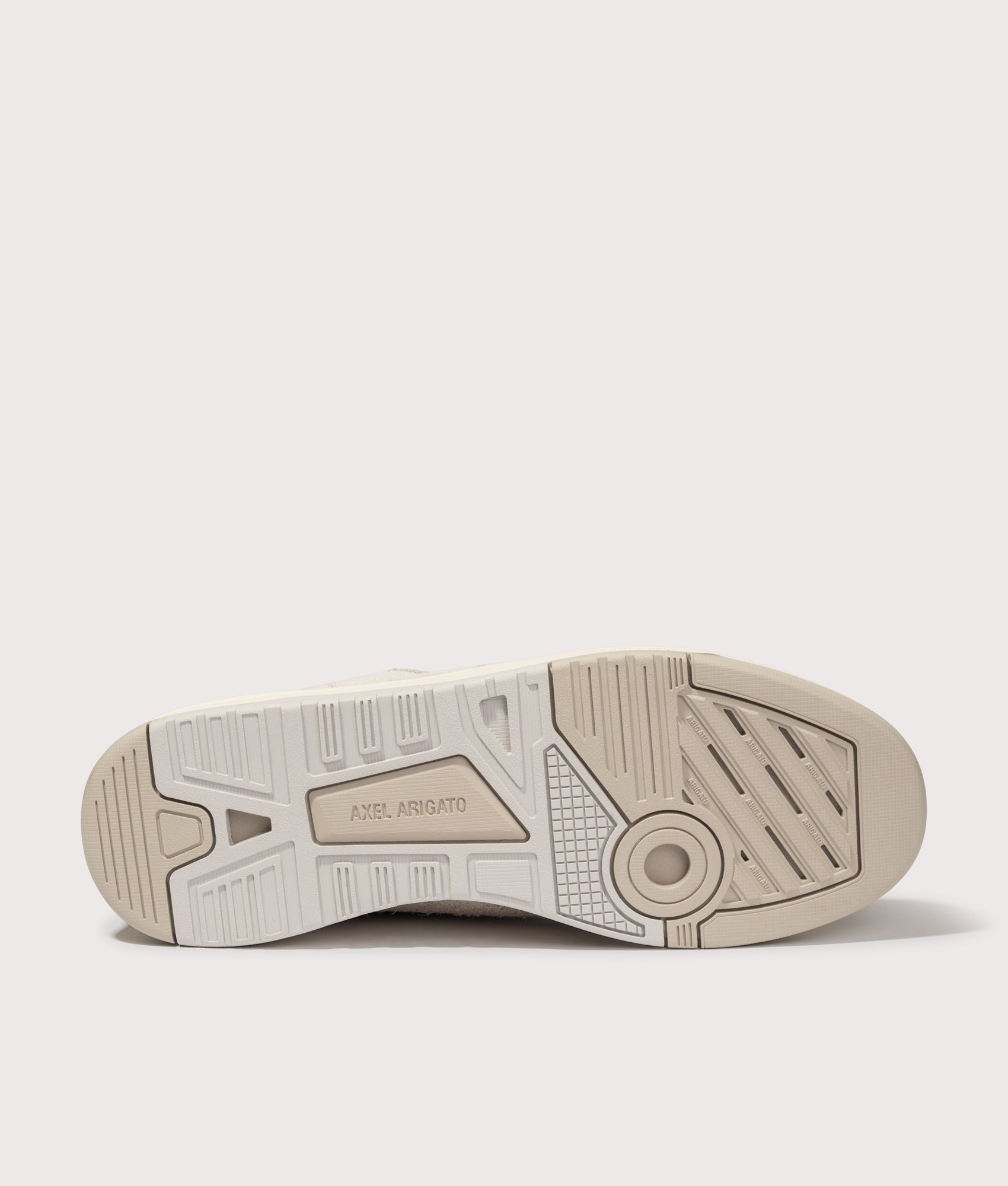 Axel Arigato Clay Sneakers in Beige and Light Taupe at EQVVS Menswear. Tread shot.