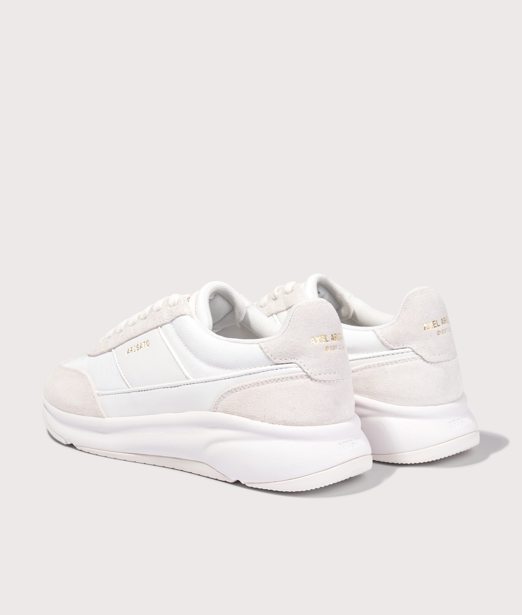 Axel Arigato Genesis Neo Runners in White/White at EQVVS Menswear. Angled back shot.