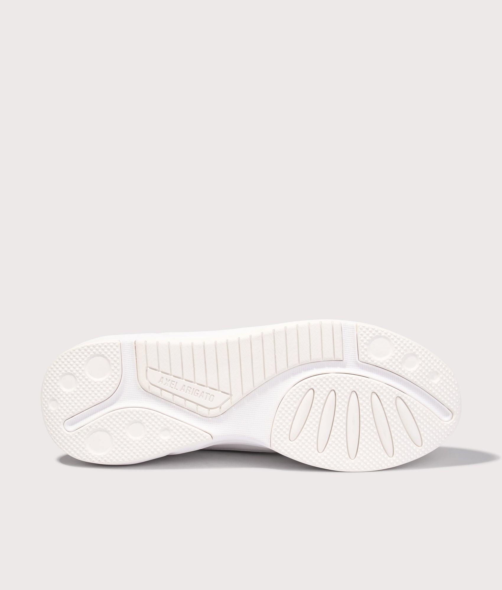 Axel Arigato Genesis Neo Runners in White/White at EQVVS Menswear. Tread shot.