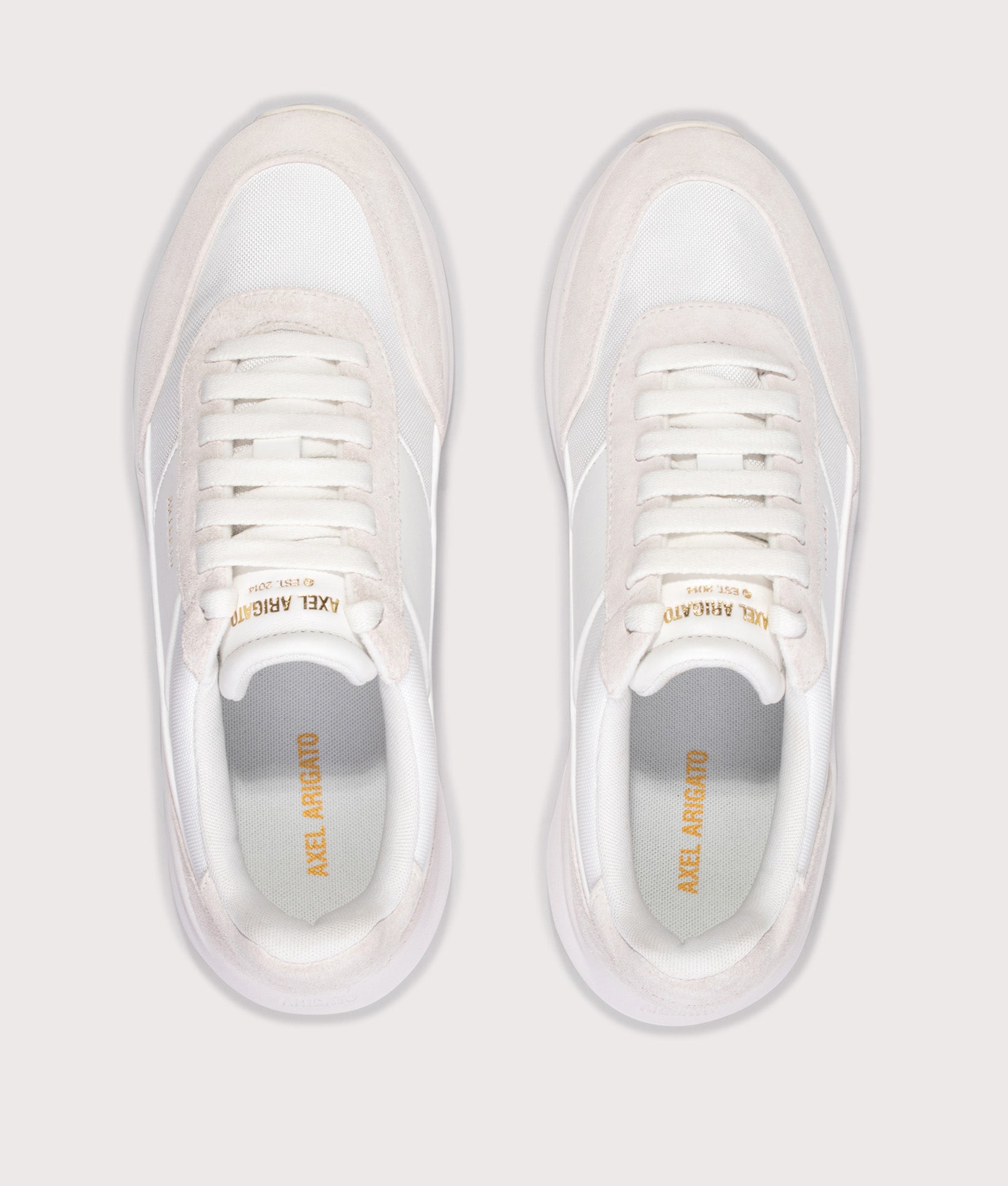 Axel Arigato Genesis Neo Runners in White/White at EQVVS Menswear. Top shot.