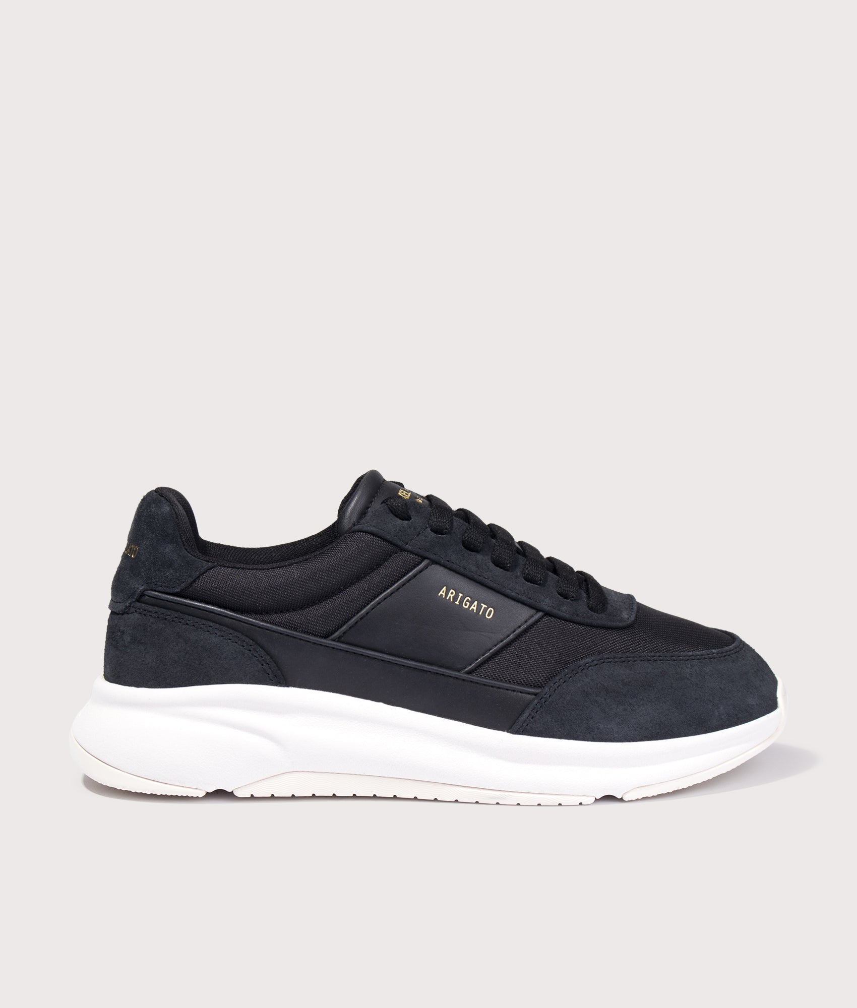 Axel Arigato Genesis Neo Runners in Black/White at EQVVS Menswear. Side shot.