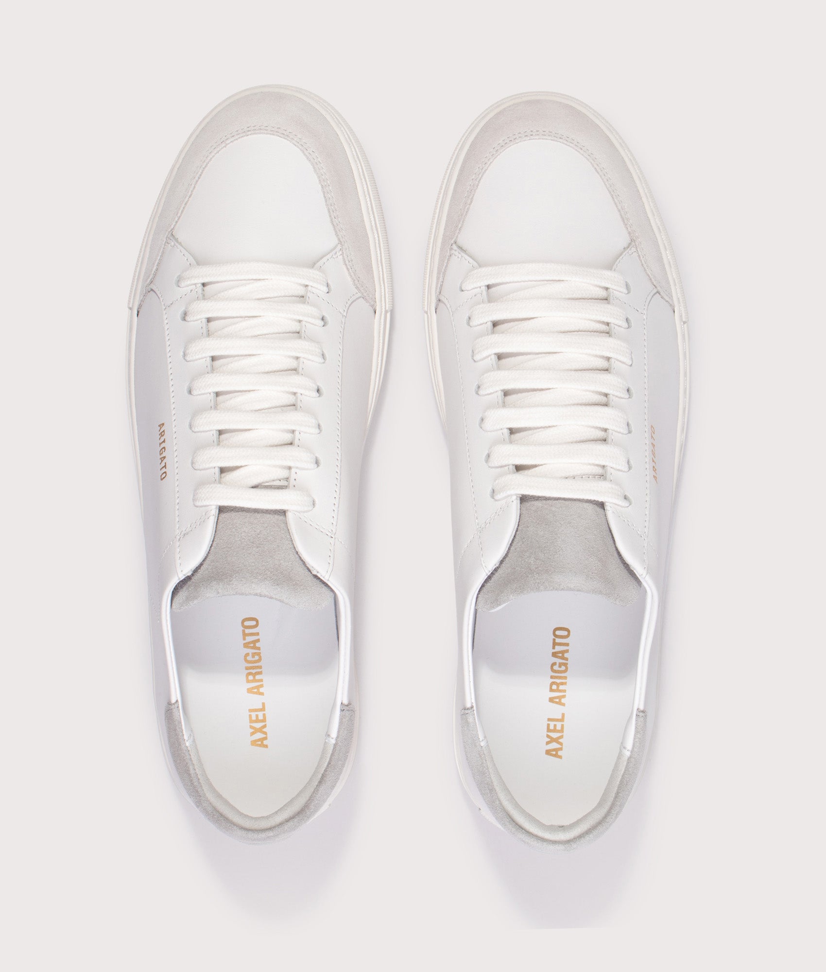 Axel Arigato Clean 90 Triple Sneakers in White/Grey at EQVVS Menswear. Top shot.