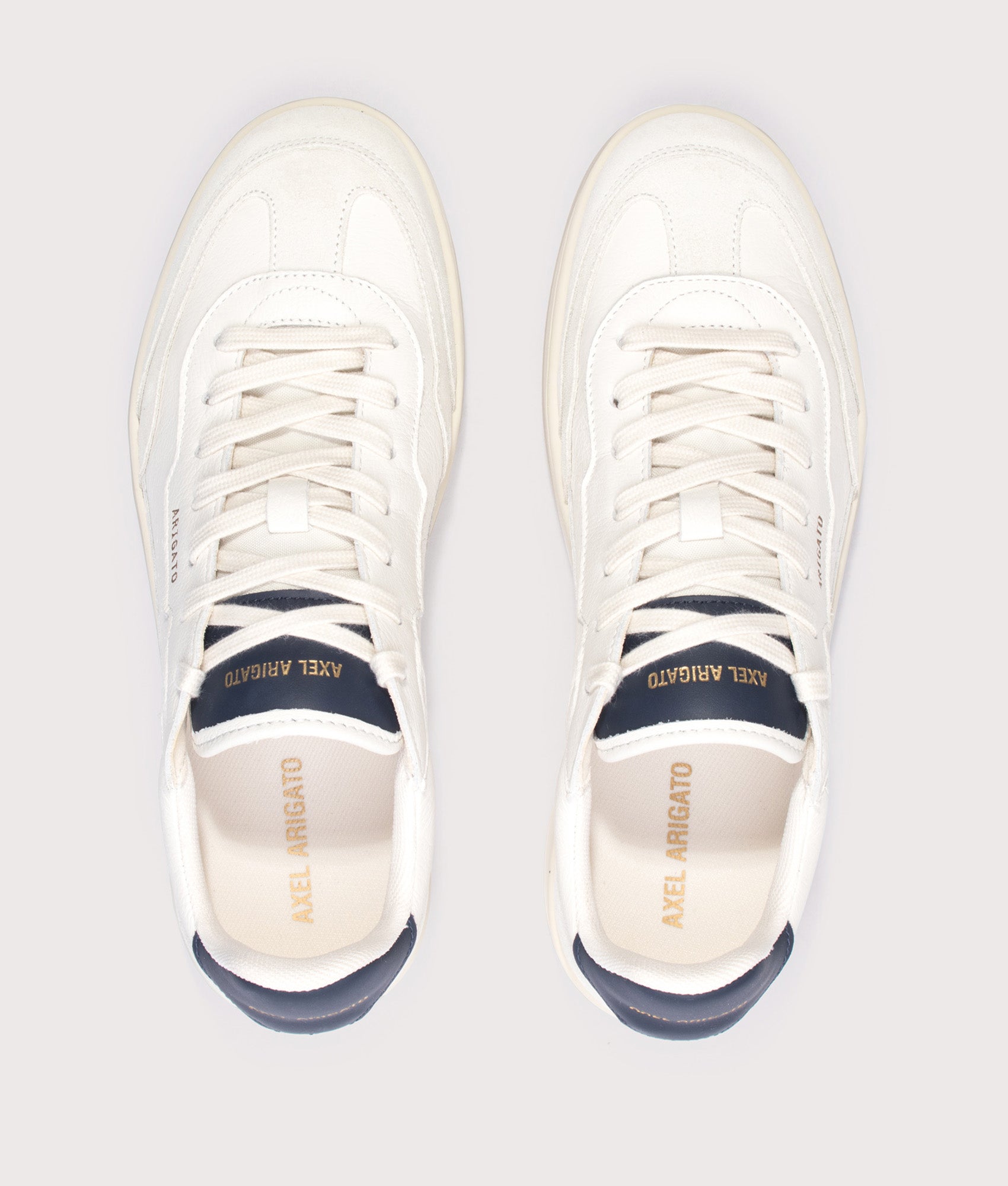 Axel Arigato Dice T-Toe Sneakers in Light Beige and Dark Blue at EQVVS Menswear. Top shot.