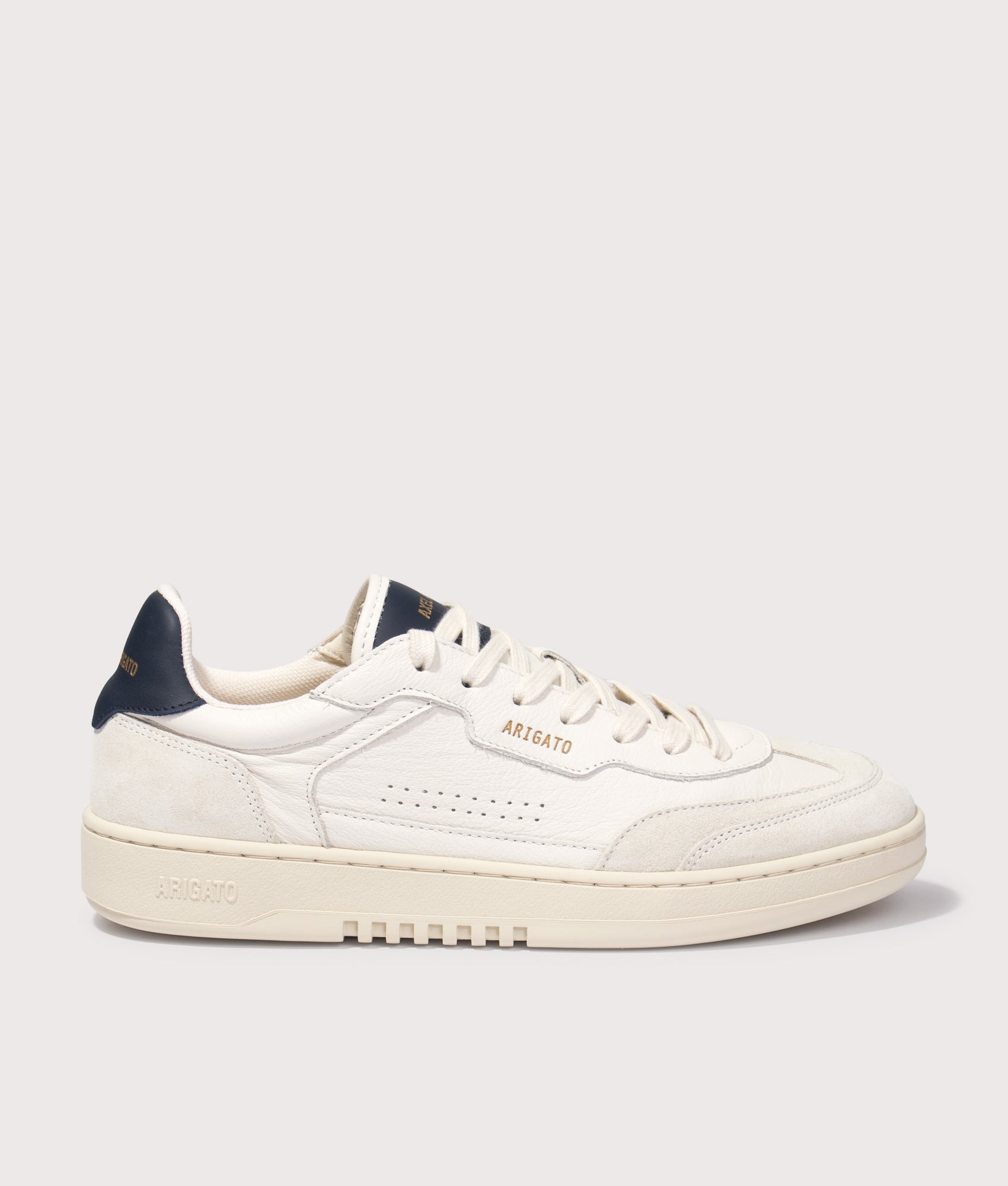 Axel Arigato Dice T-Toe Sneakers in Light Beige and Dark Blue at EQVVS Menswear. Side shot.