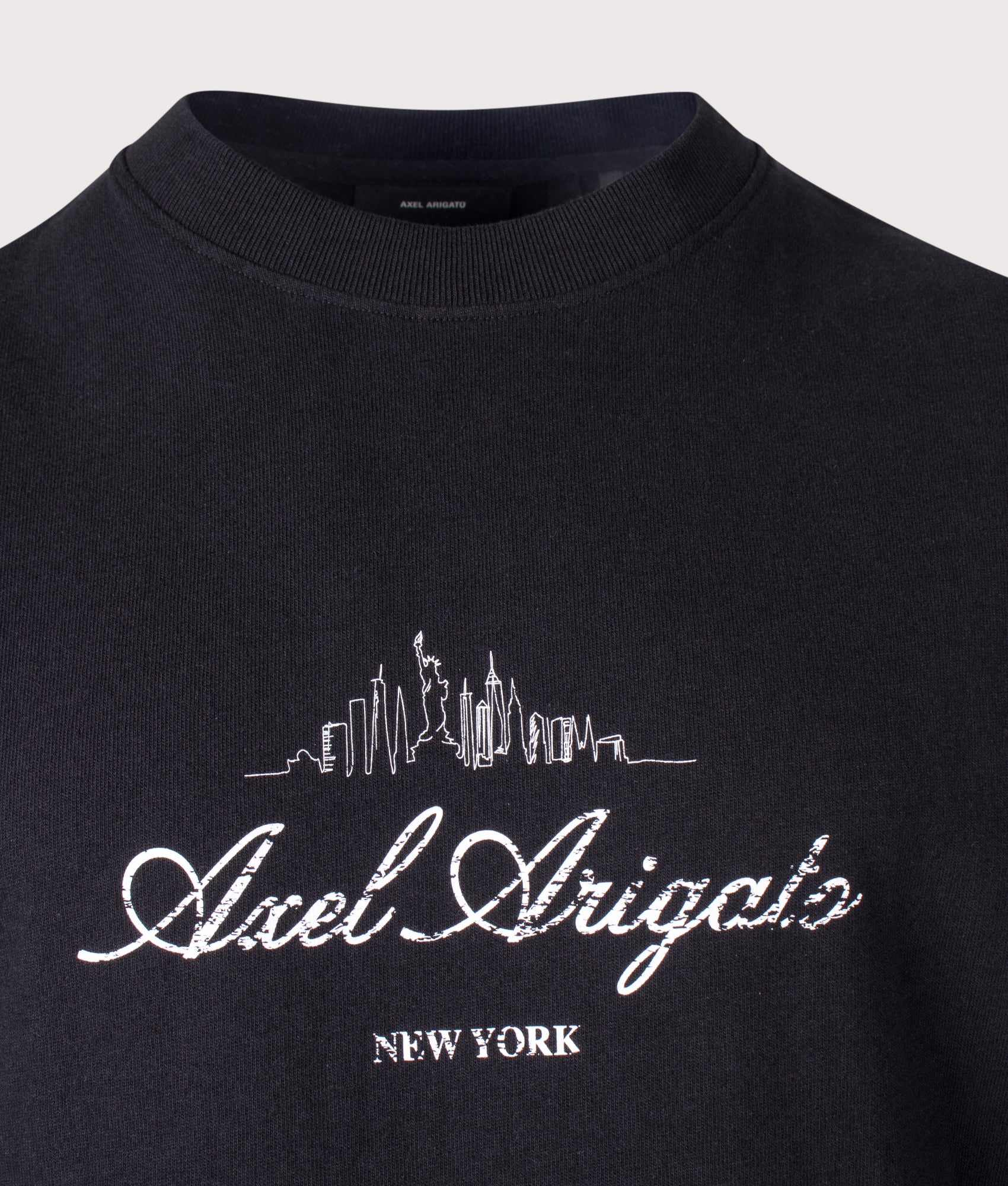 Axel Arigato Oversized Fit NYC Sky T-Shirt in Black at EQVVS Menswear. Detail shot.