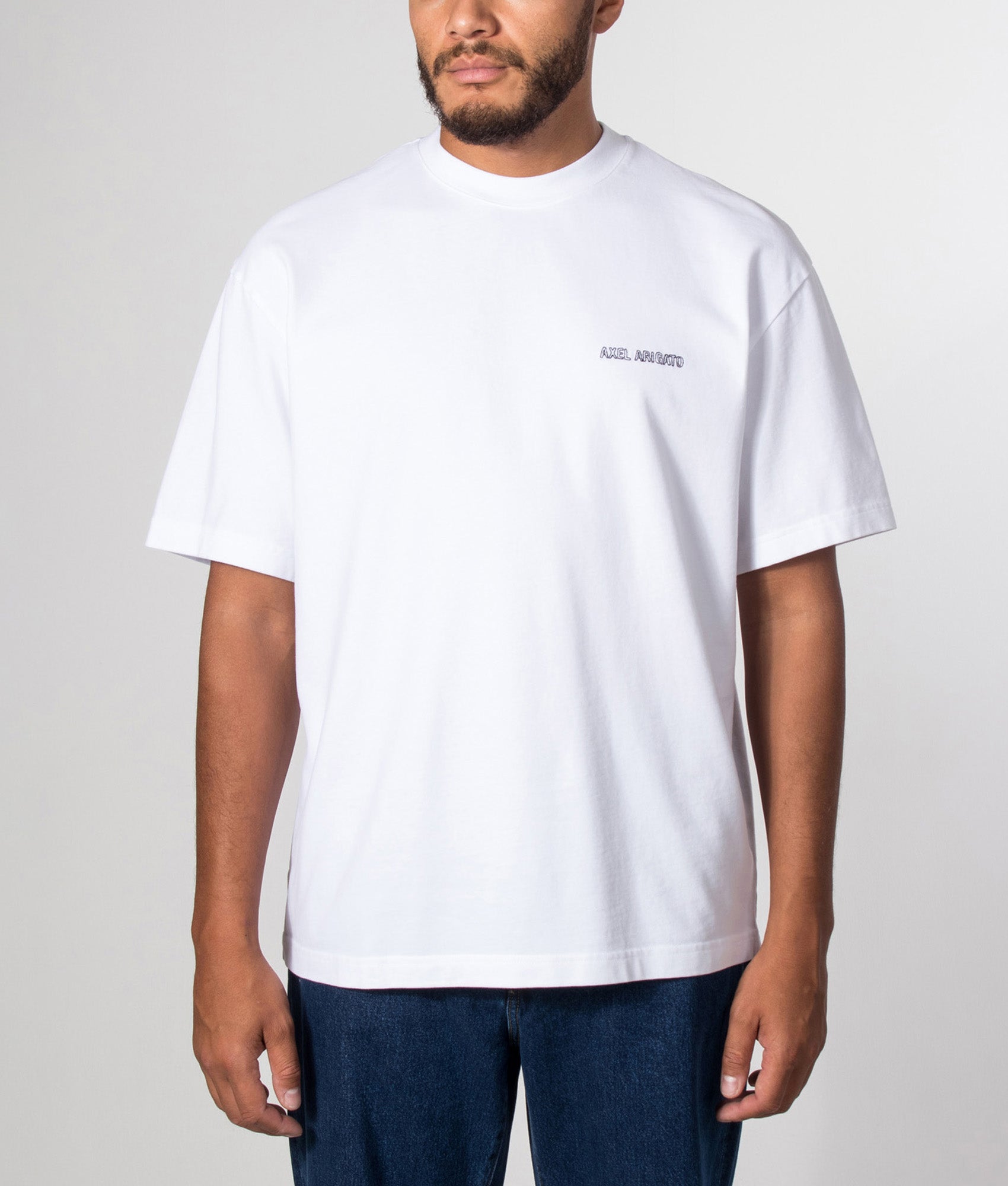 Axel Arigato Oversized Fit Forest Sketch T-Shirt in White at EQVVS Menswear. Model front shot.