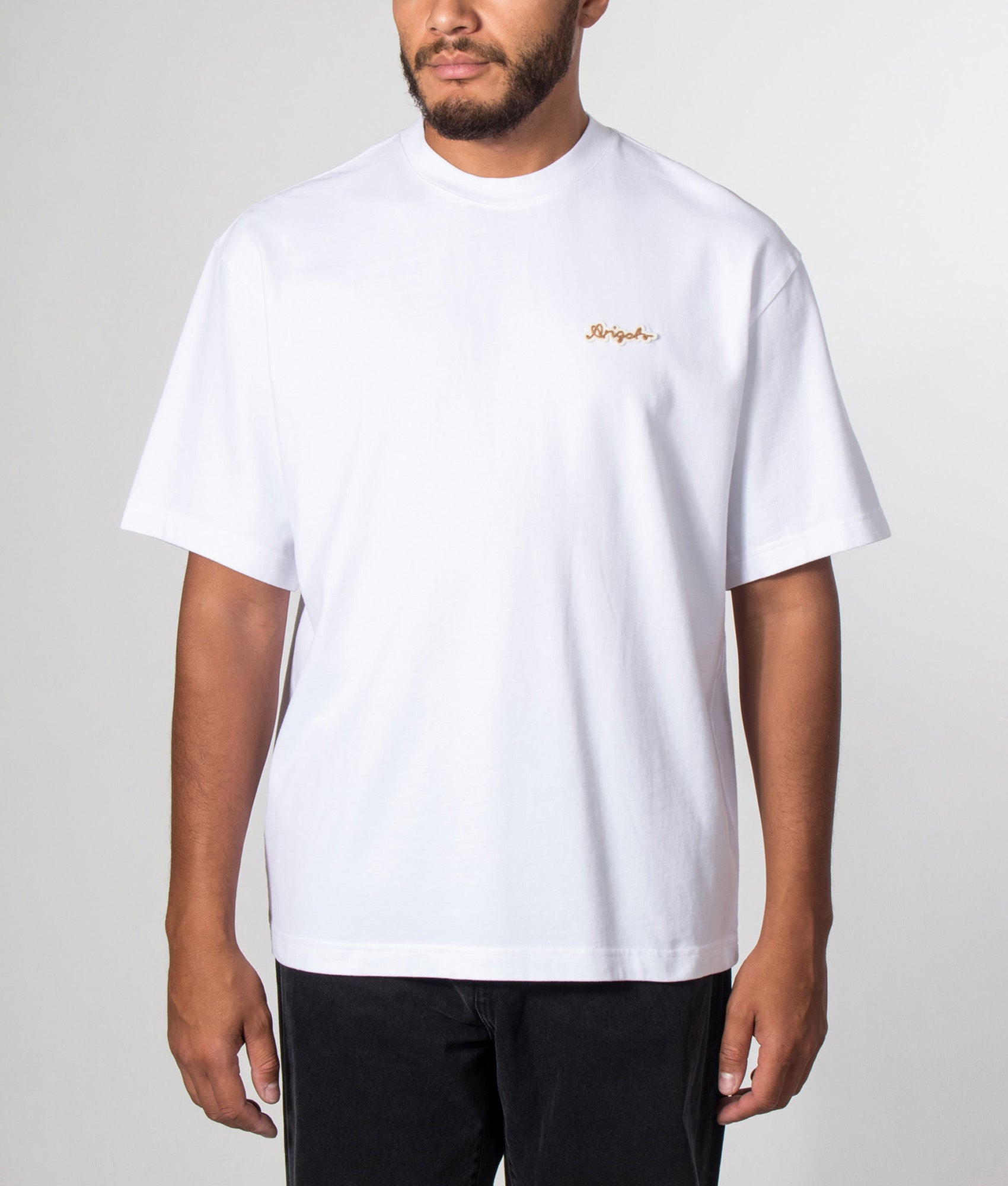 Axel Arigato Oversized Fit Trace T-Shirt in White at EQVVS Menswear. Model front shot.