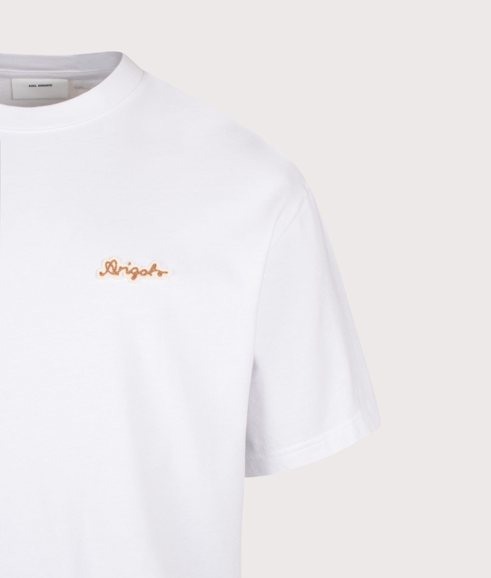 Axel Arigato Oversized Fit Trace T-Shirt in White at EQVVS Menswear. Detail shot.