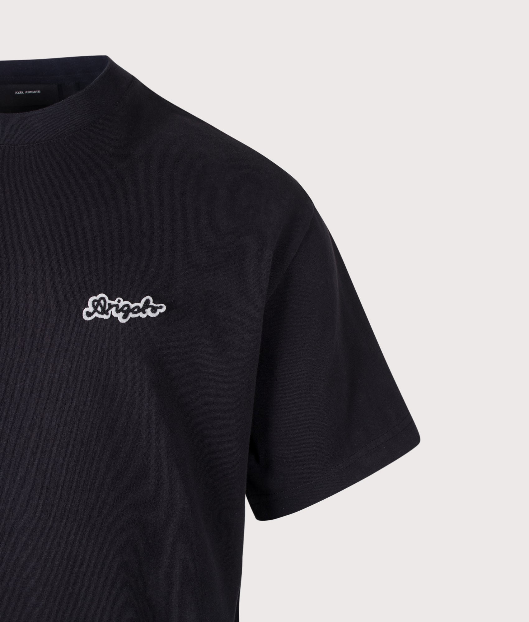 Axel Arigato Oversized Fit Trace T-Shirt in Black at EQVVS Menswear. Detail shot.