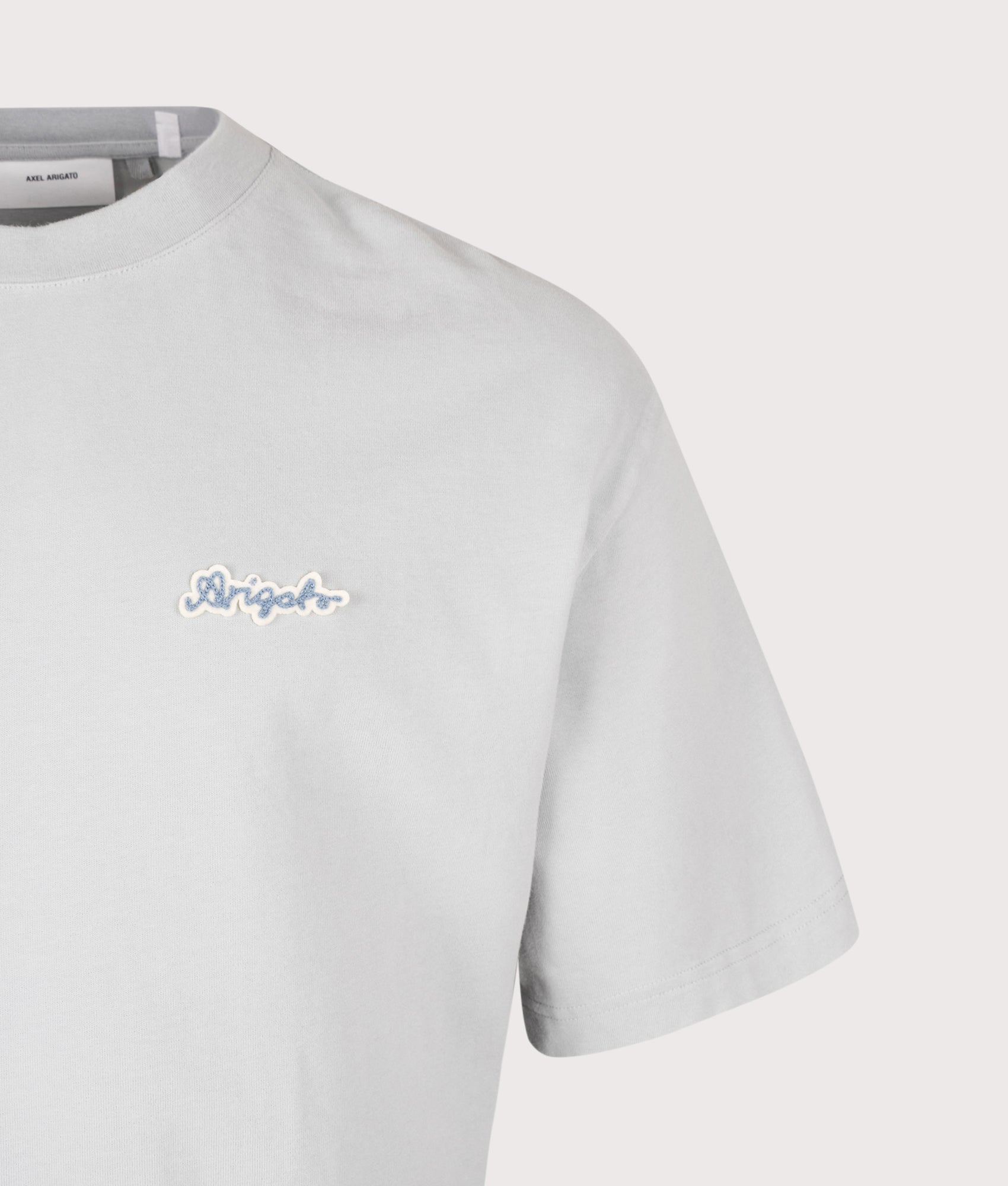 Axel Arigato Oversized Fit Trace T-Shirt in Stone Blue at EQVVS Menswear. Detail shot.