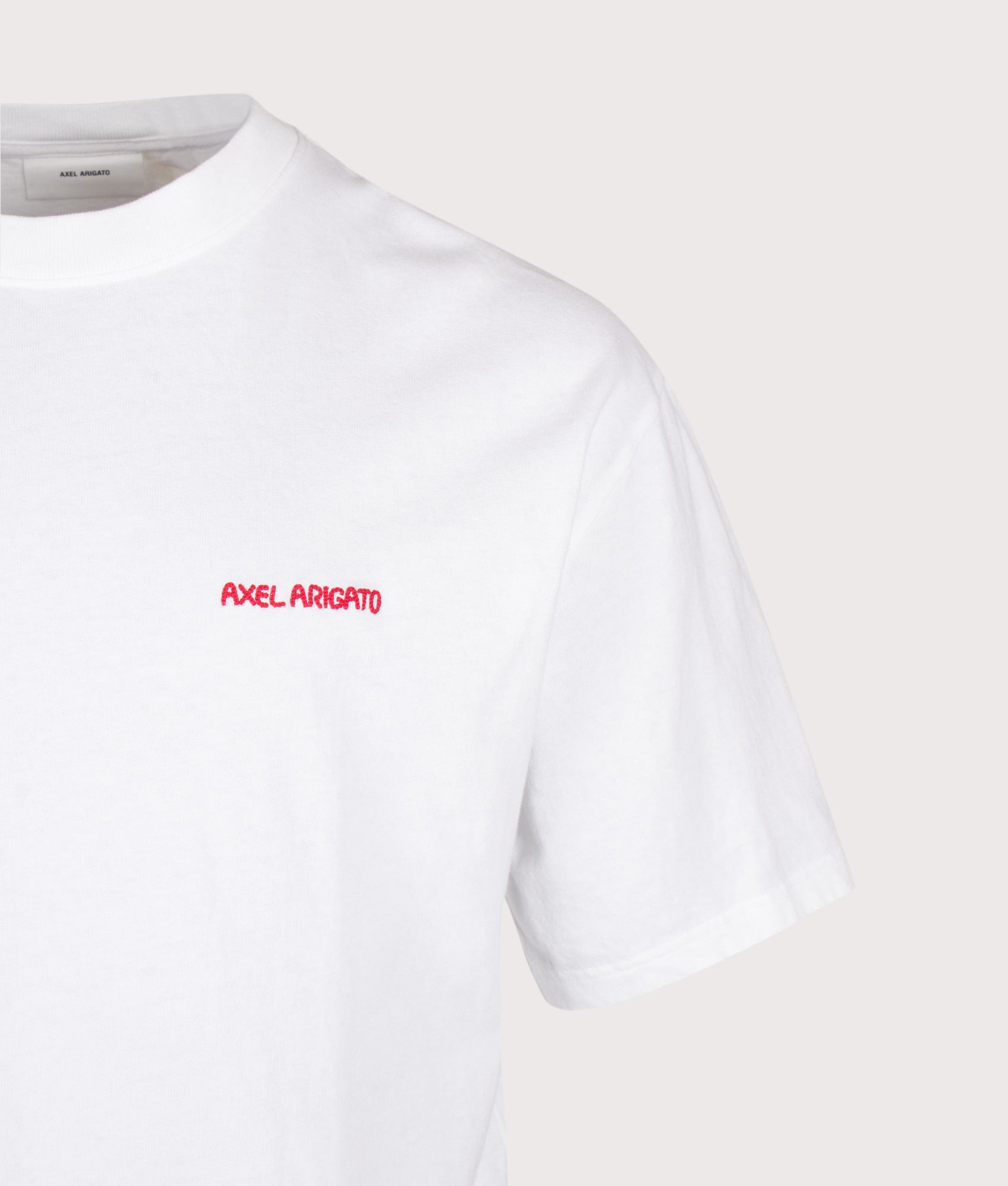 Axel Arigato Oversized Fit Curb T-Shirt in White at EQVVS Menswear. Detail shot.