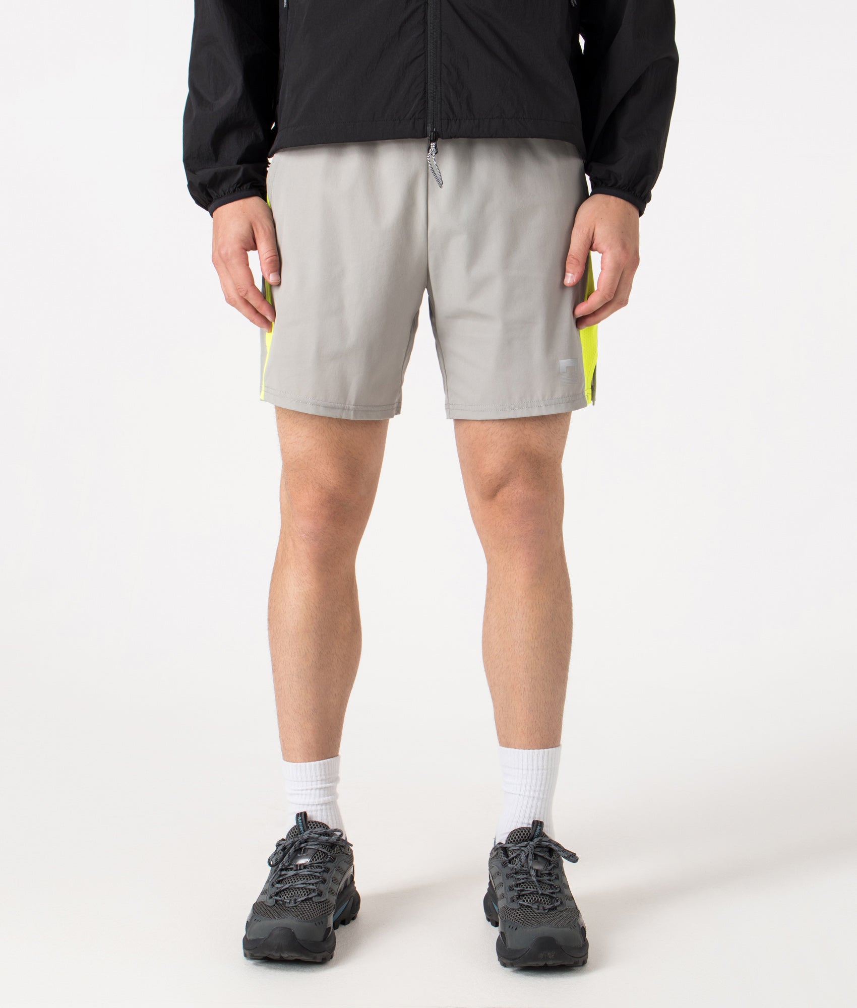 Zone Shorts by Reflect in Grey/Neon. Shot by EQVVS. Front shot.