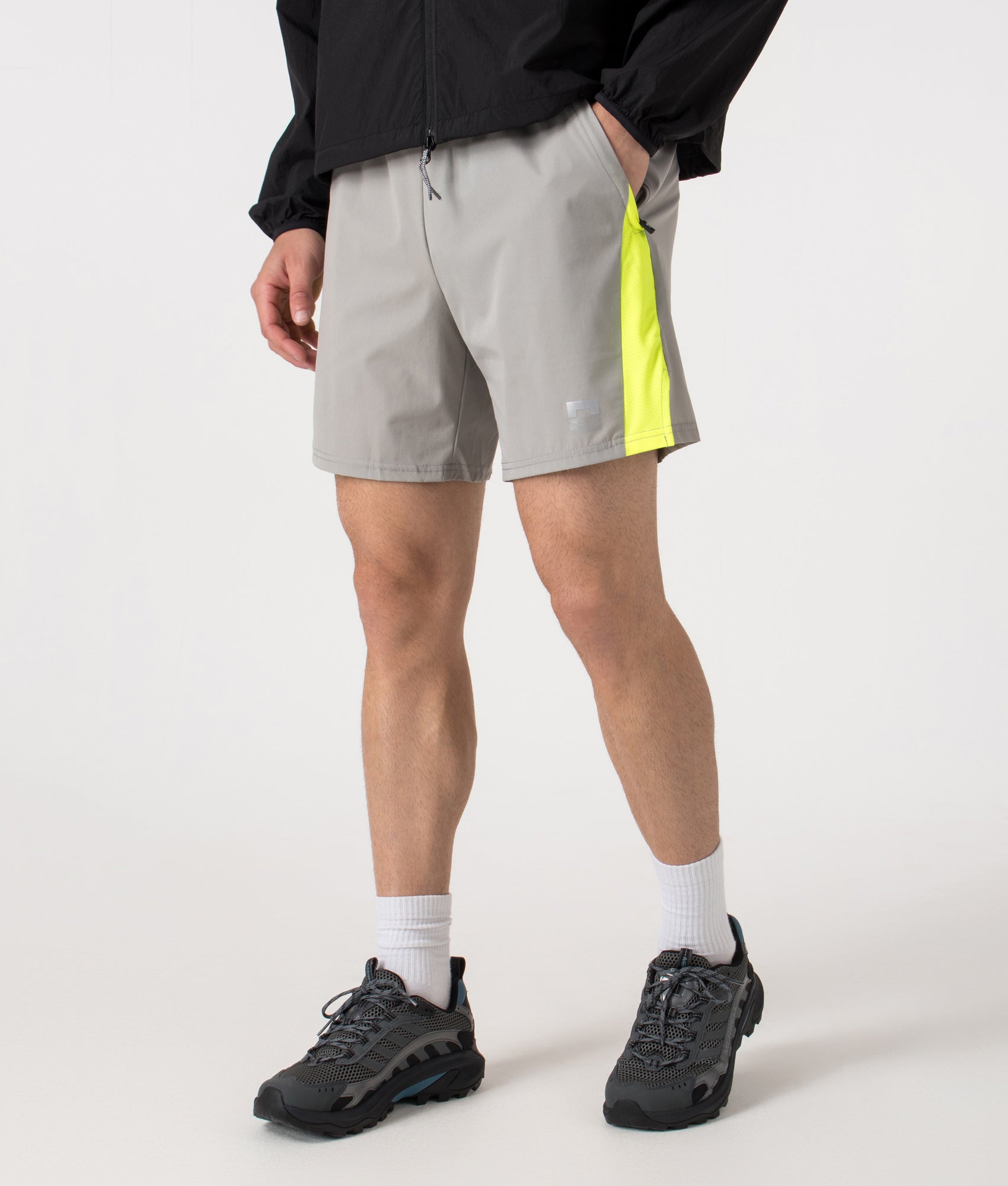 Zone Shorts by Reflect in Grey/Neon. Shot by EQVVS. Front angled shot.