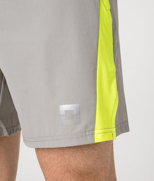 Zone Shorts by Reflect in Grey/Neon. Shot by EQVVS. Front detail shot.