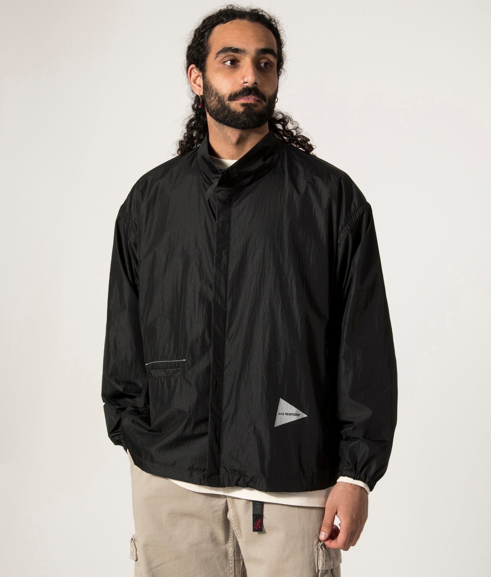 and Wander Oversized Rip Jacket in Black. Shot at EQVVS. Front Model Shot.