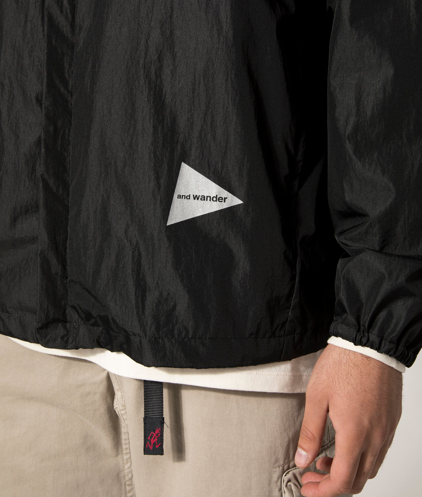and Wander Oversized Rip Jacket in Black. Shot at EQVVS. Detail Model Shot.
