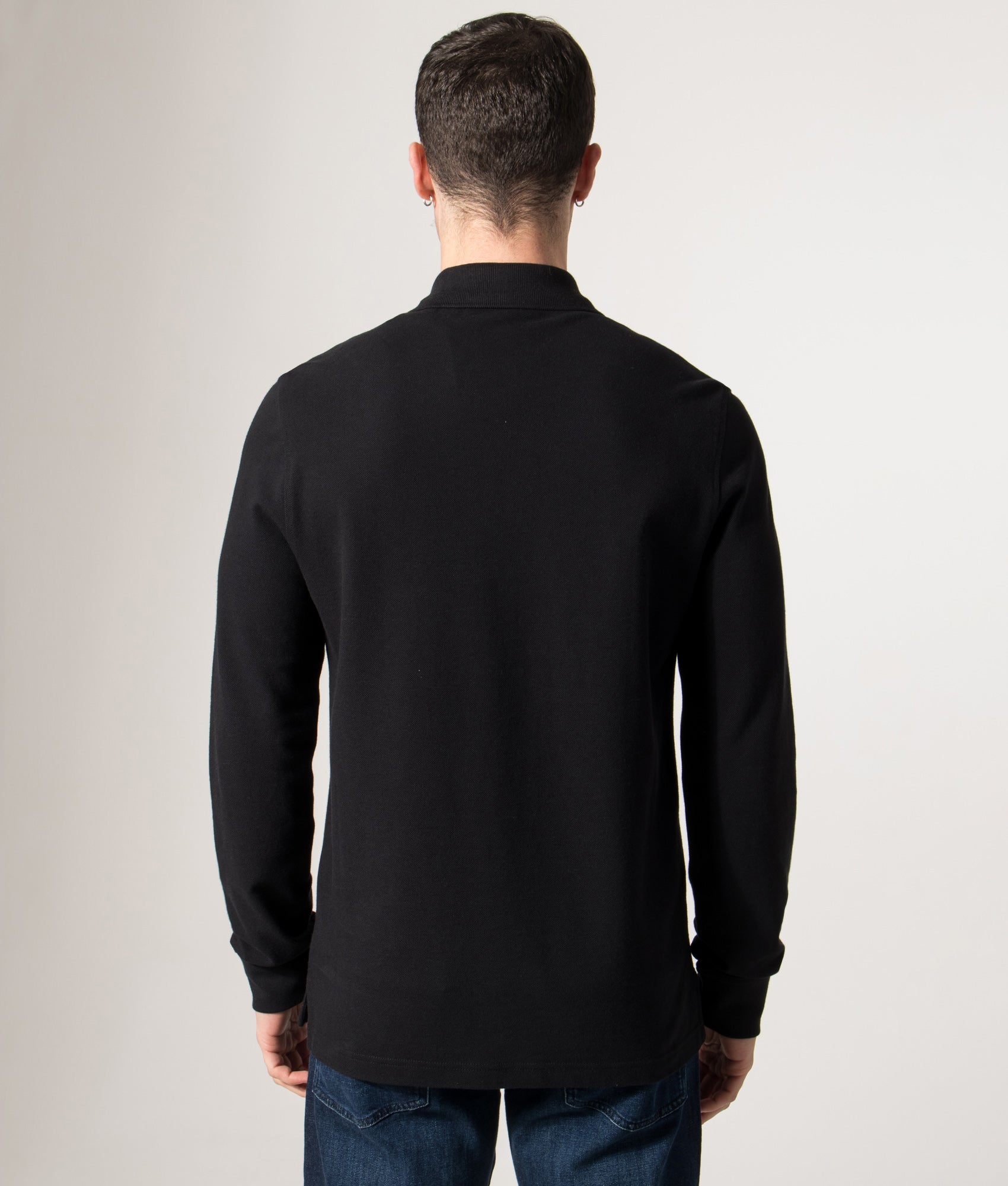 Belstaff Long Sleeve Polo Shirt in Black at EQVVS Menswear. Model back shot.