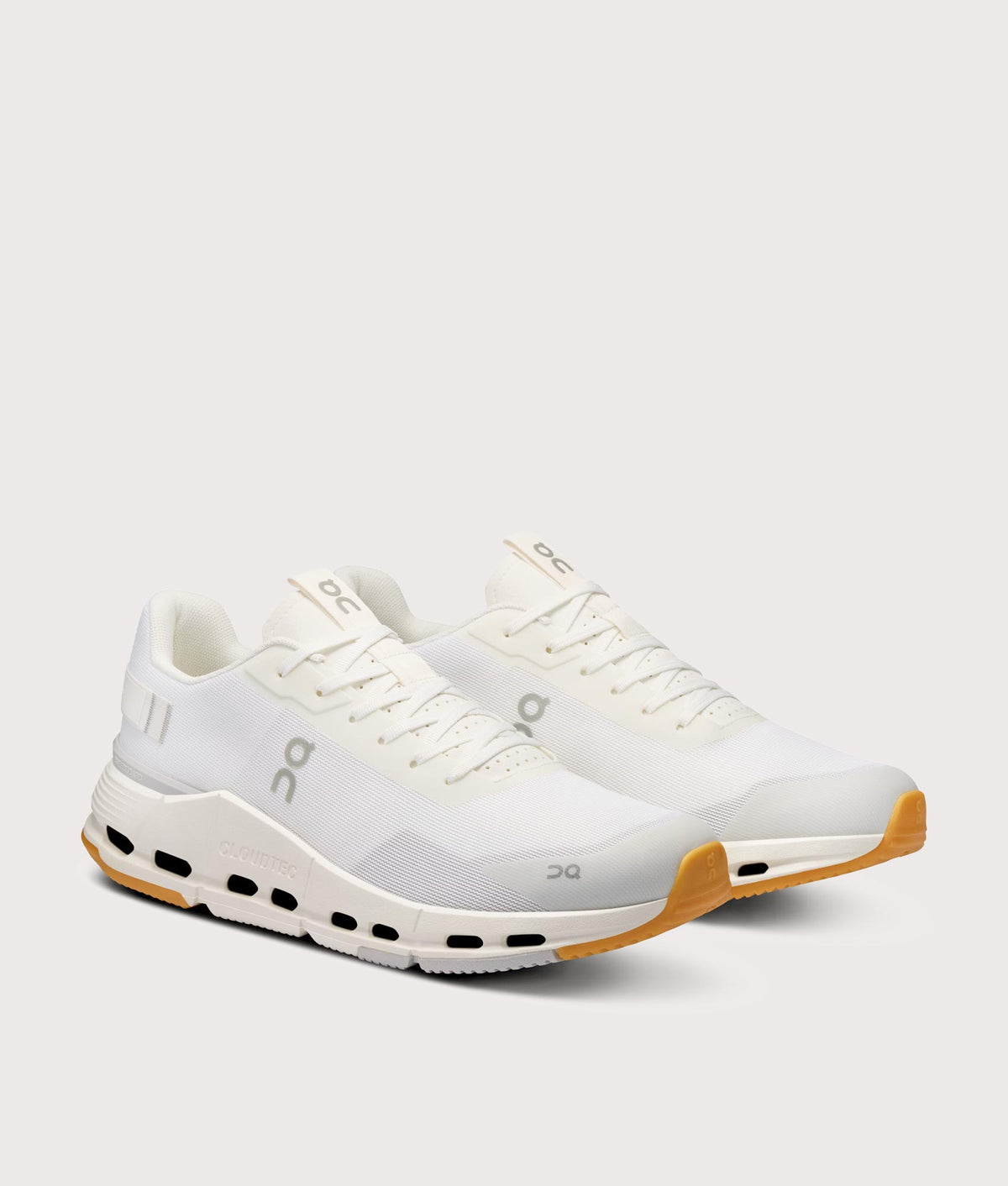 On Cloudnova Form 2 Sneakers in White and Ivory at EQVVS Menswear. Angled front shot.