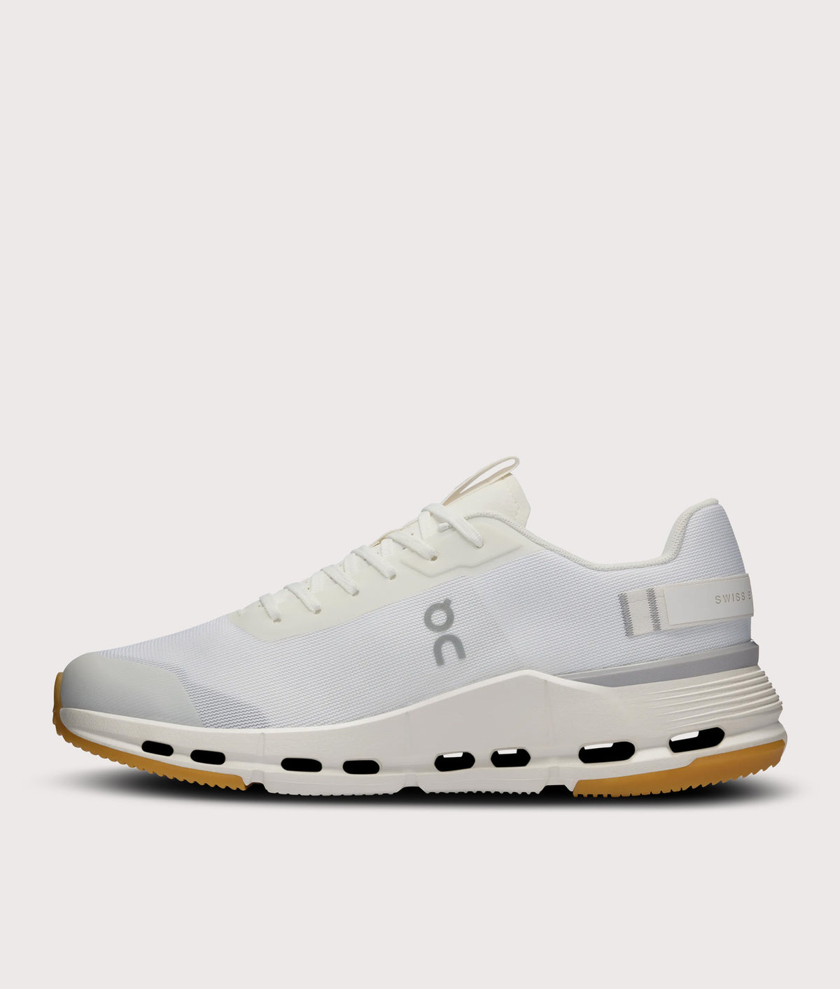On Cloudnova Form 2 Sneakers in White and Ivory at EQVVS Menswear. Side shot.