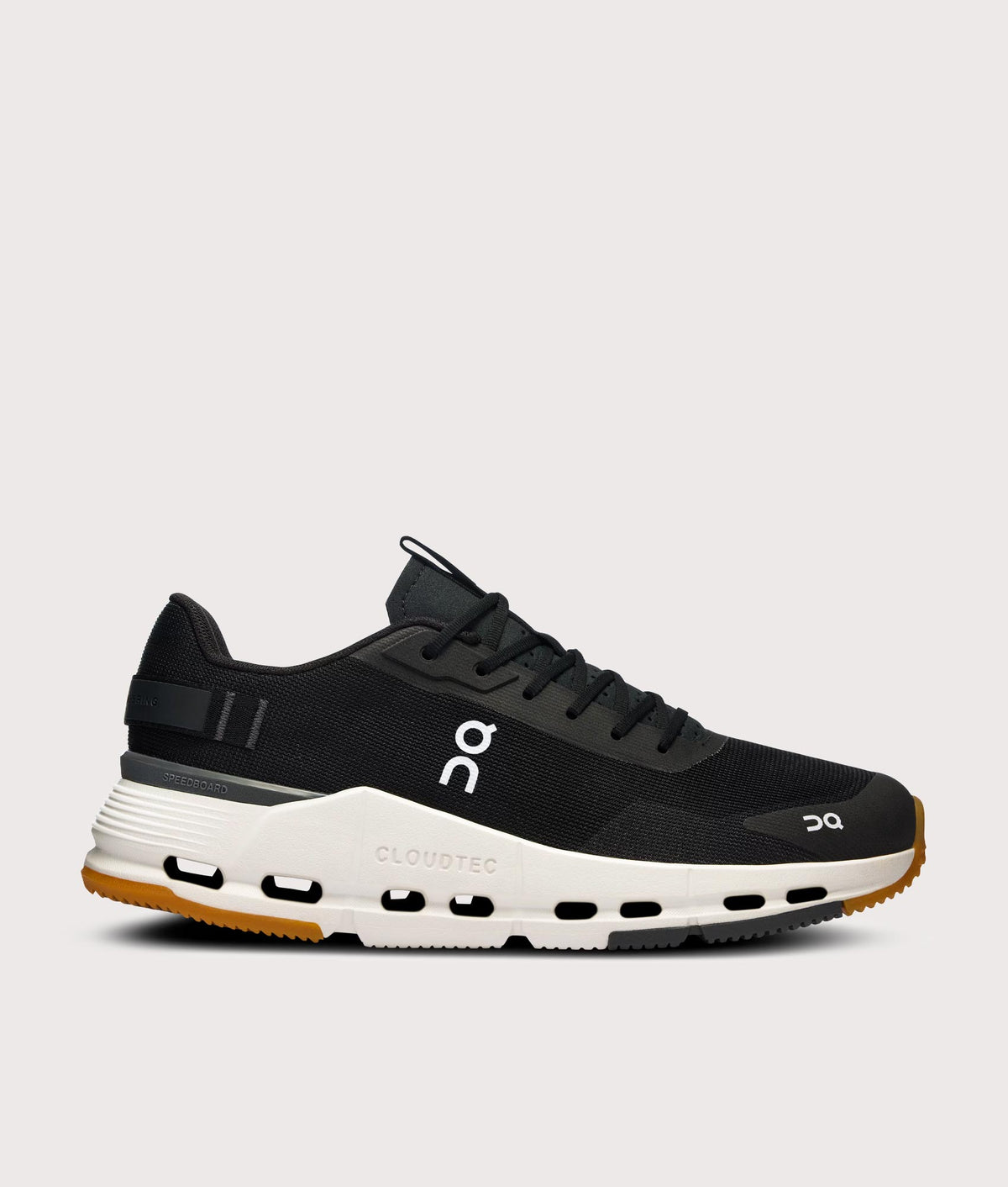 On Cloudnova Form 2 Sneakers in Black and Ivory at EQVVS Menswear. Side shot.