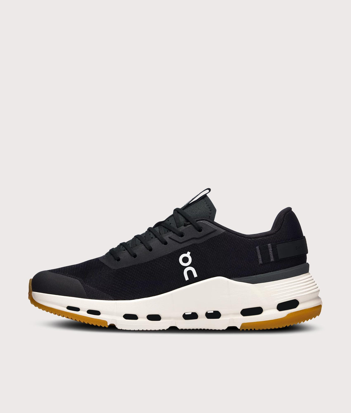 On Cloudnova Form 2 Sneakers in Black and Ivory at EQVVS Menswear. Side shot.