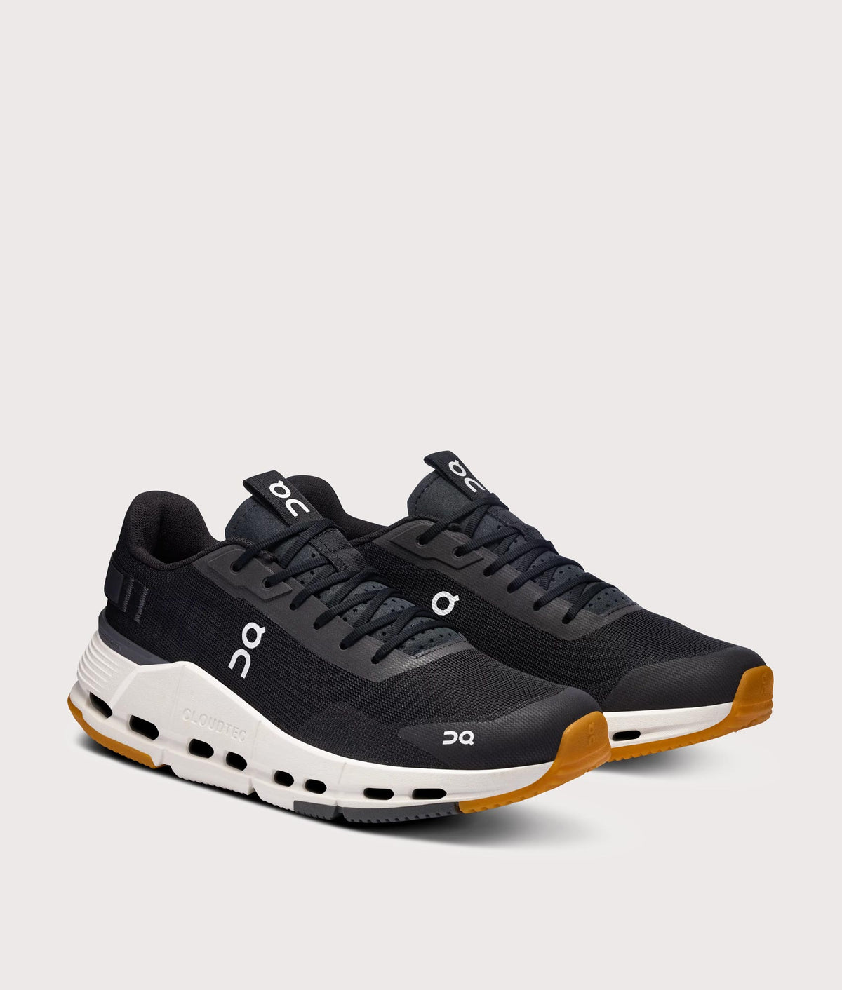 On Cloudnova Form 2 Sneakers in Black and Ivory at EQVVS Menswear. Angled front shot.