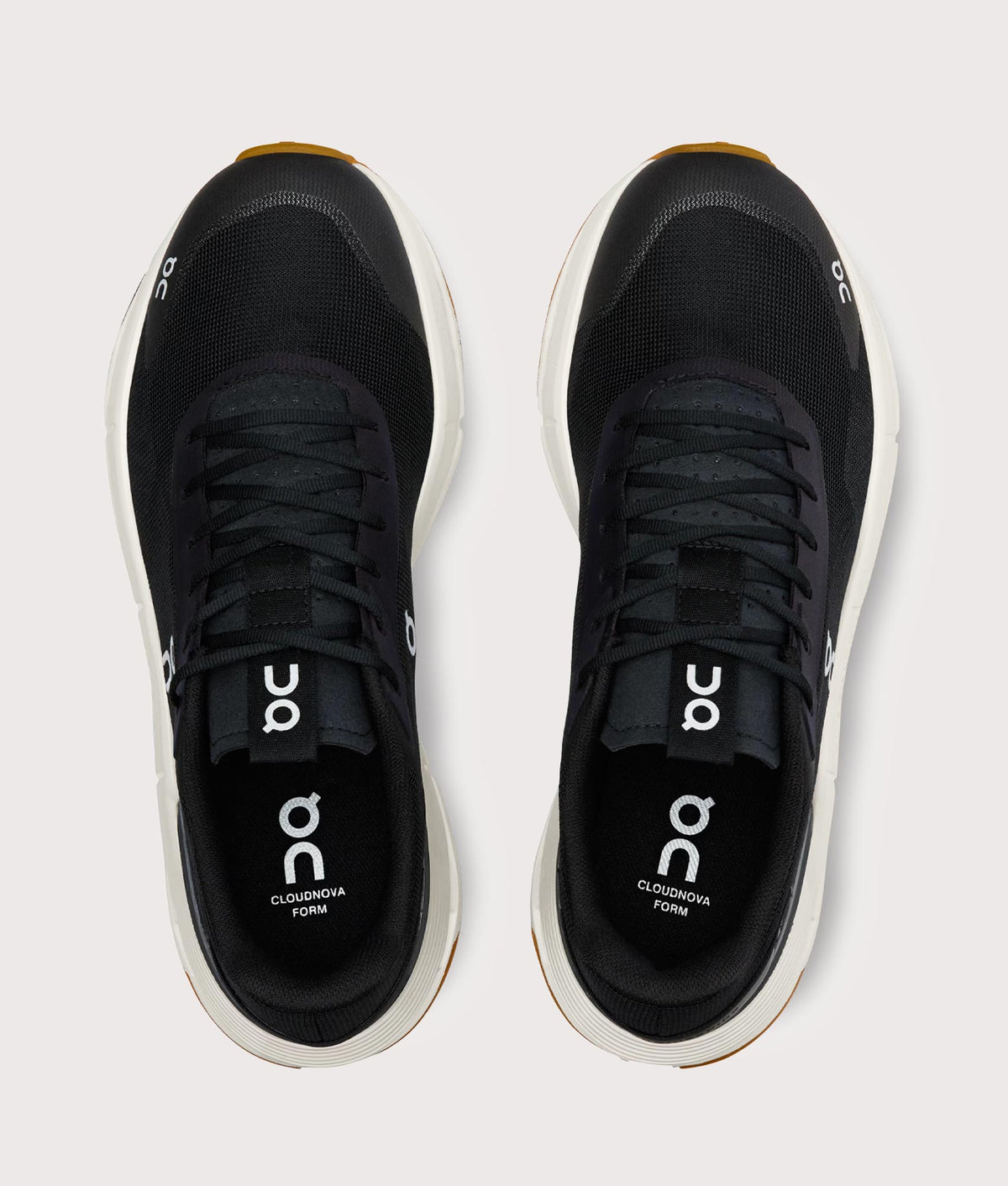 On Cloudnova Form 2 Sneakers in Black and Ivory at EQVVS Menswear. Top shot.