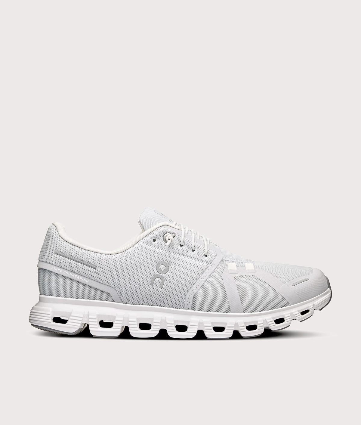 On Cloud 6 Sneakers in Glacier and White at EQVVS Menswear. Side shot.